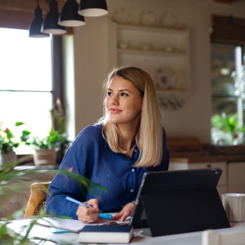 Young woman studying online at home