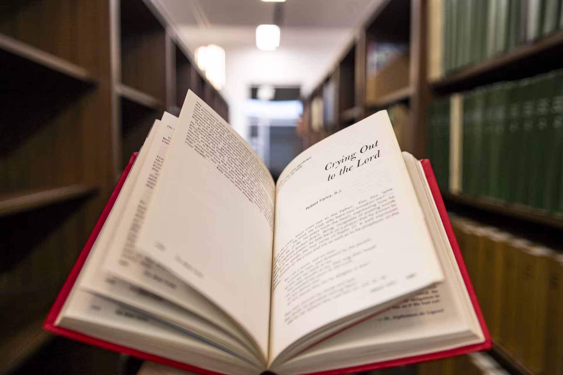 Close up image of open religious book in library