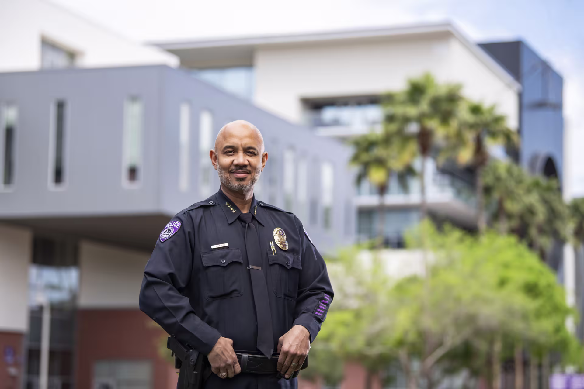 male-officer-in-uniform-smiling-posing