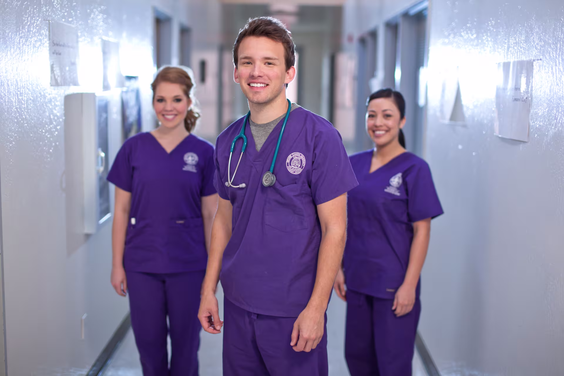 3-nurses-working-in-purple-scrubs