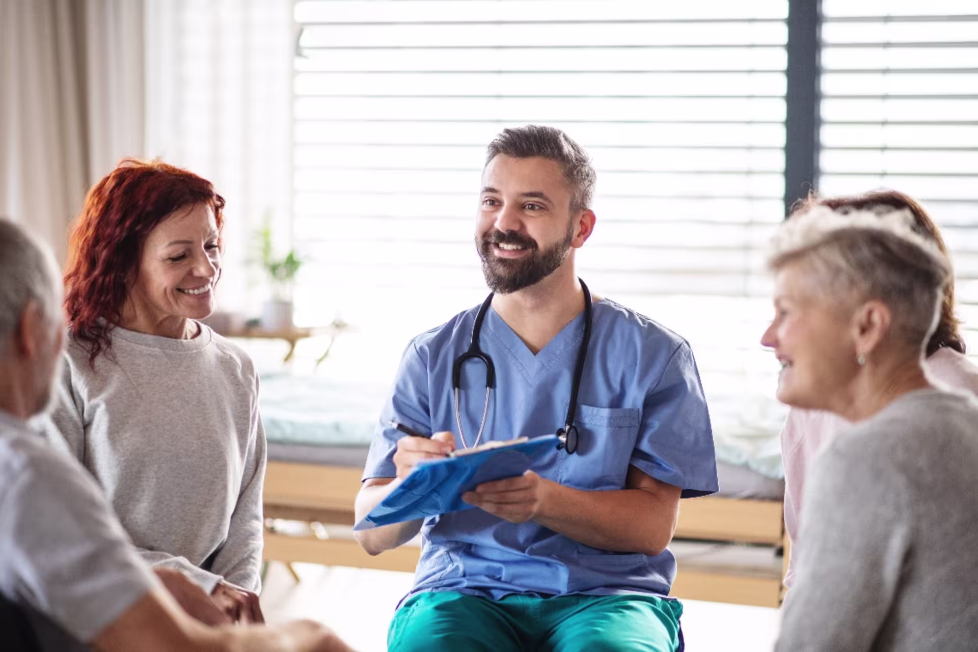 Behavioral health specialist in clinic setting with group of women