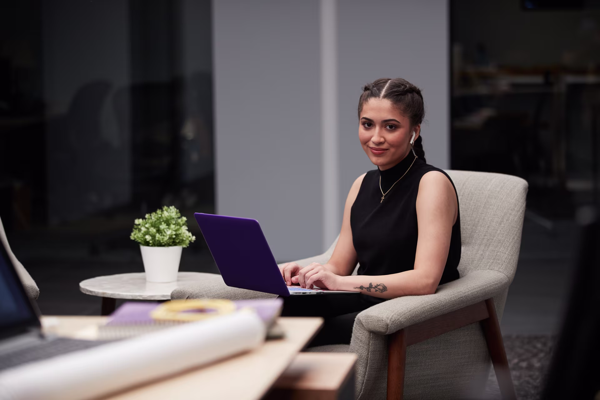 brunette-female-computer-science-student-on-laptop