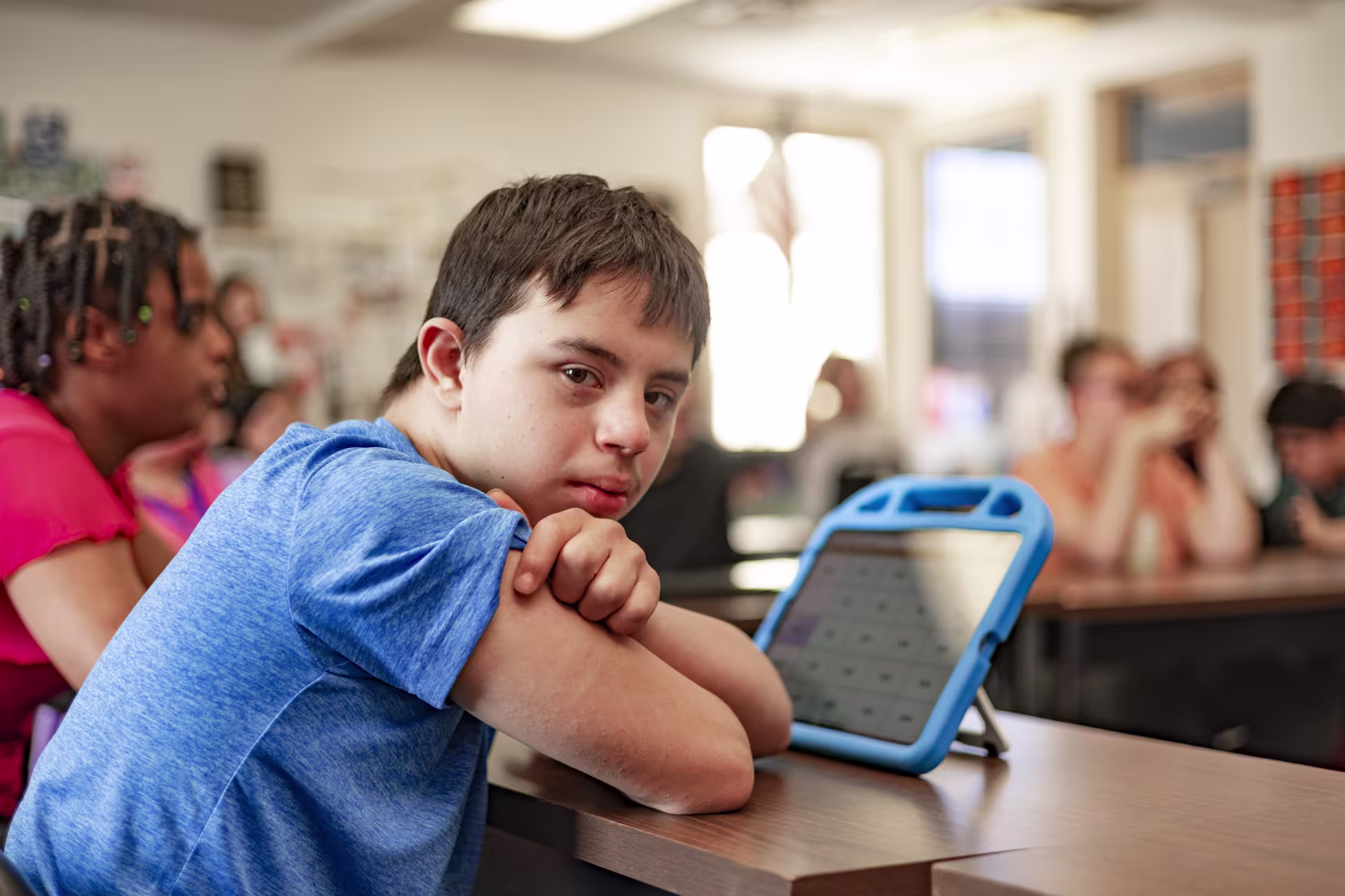 male-special-needs-student-in-class