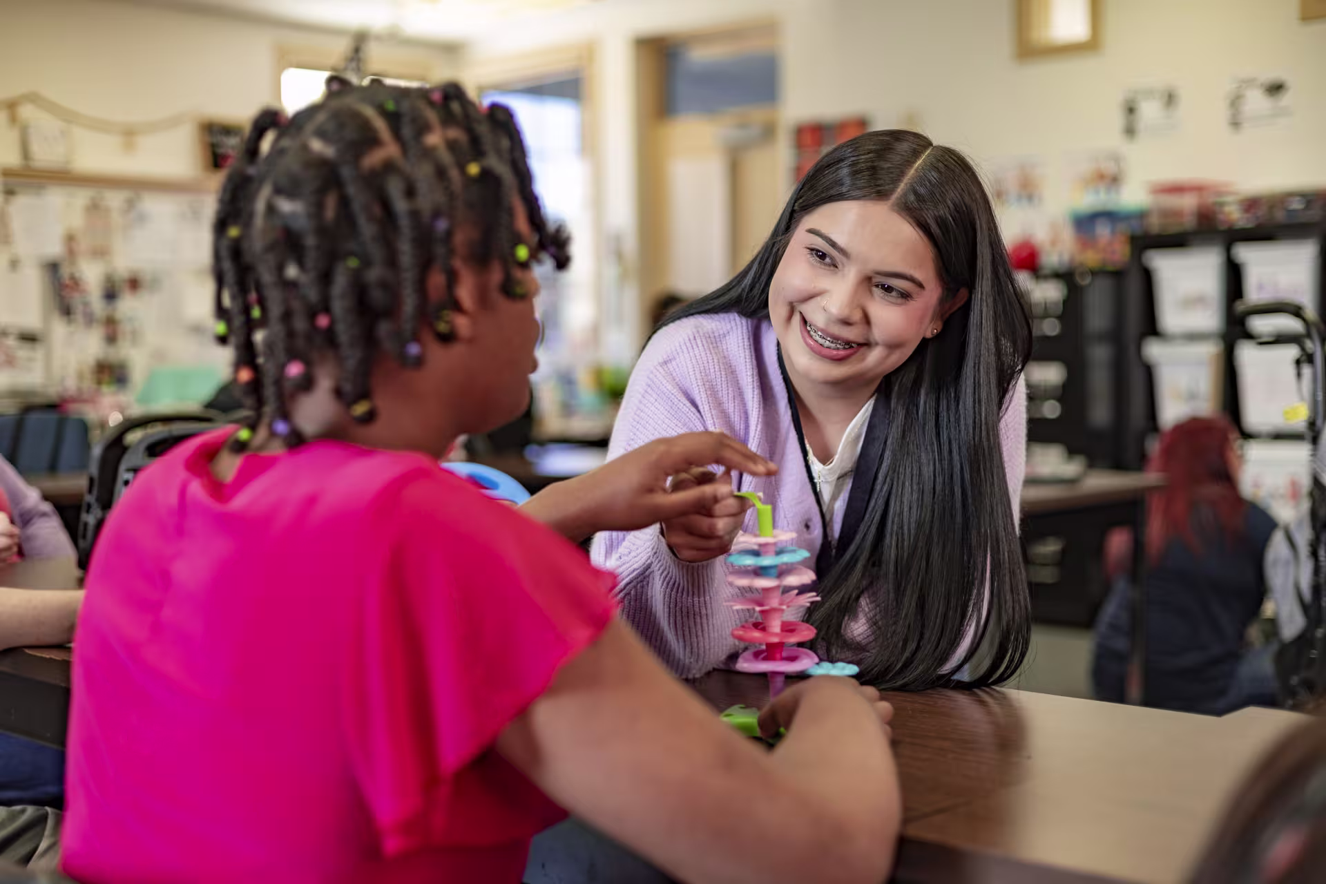 Special education teacher working with a student