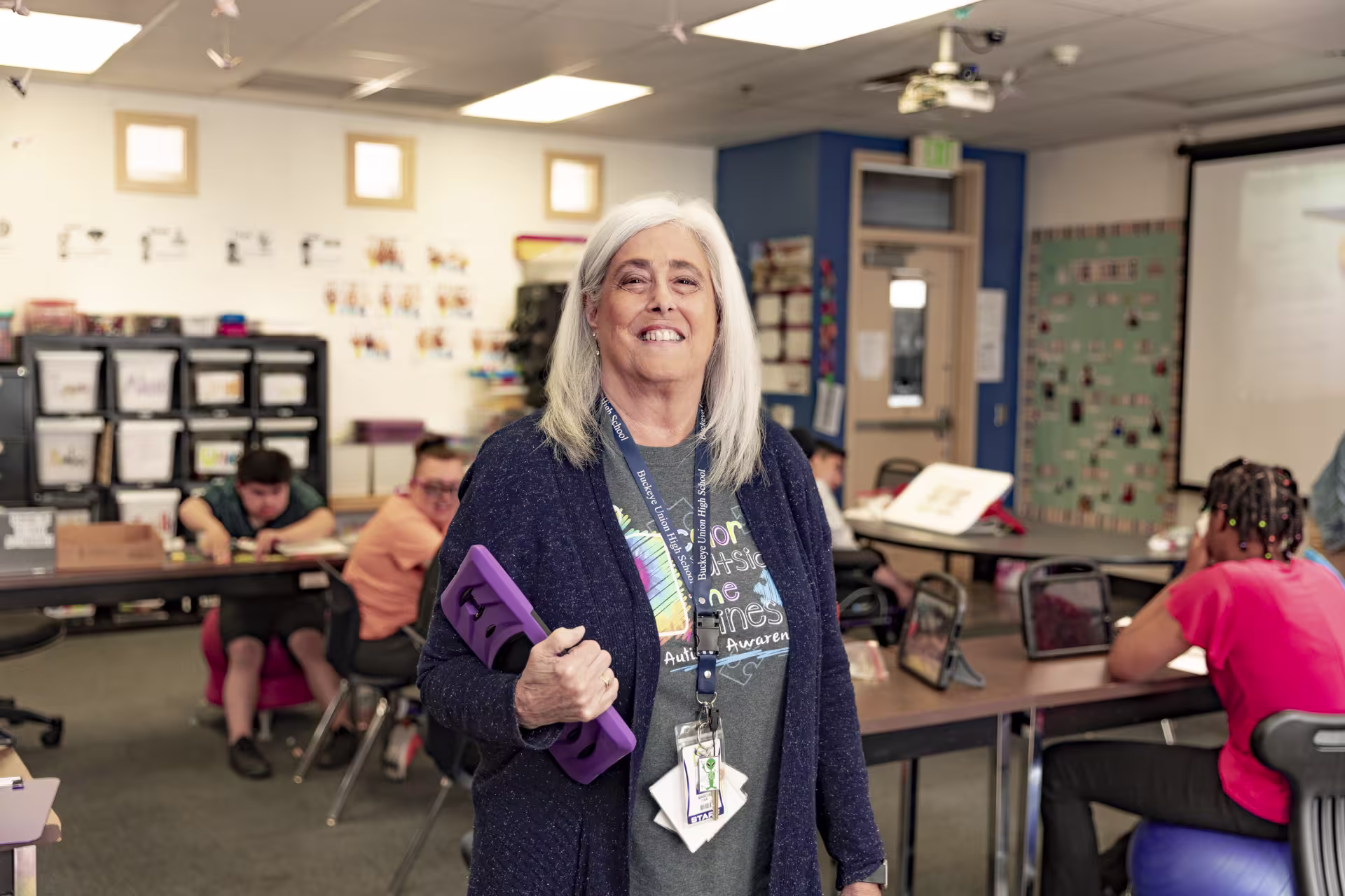 Special education teacher standing in a classroom