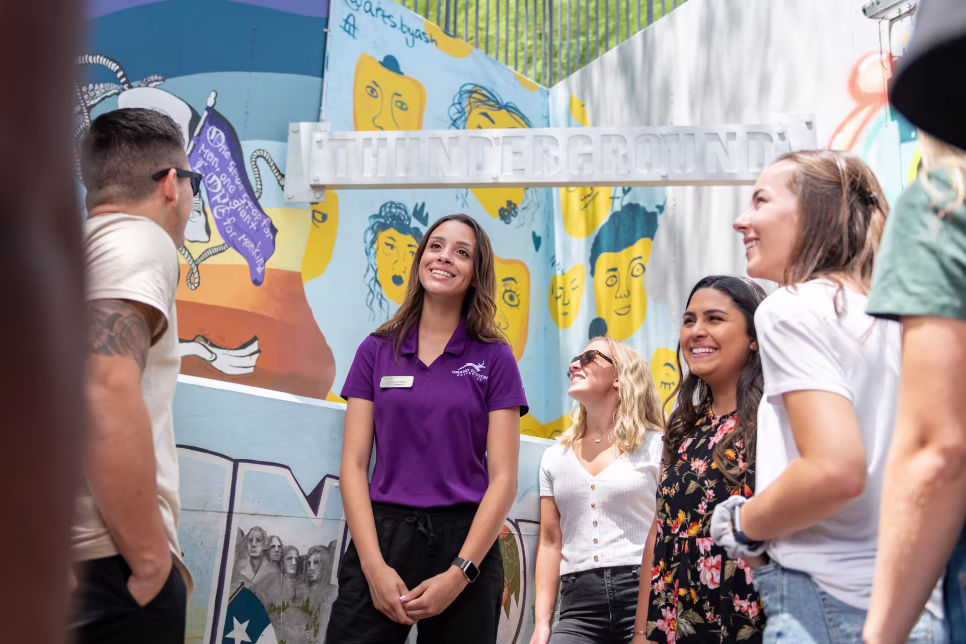Tour guide giving a tour to group of guests