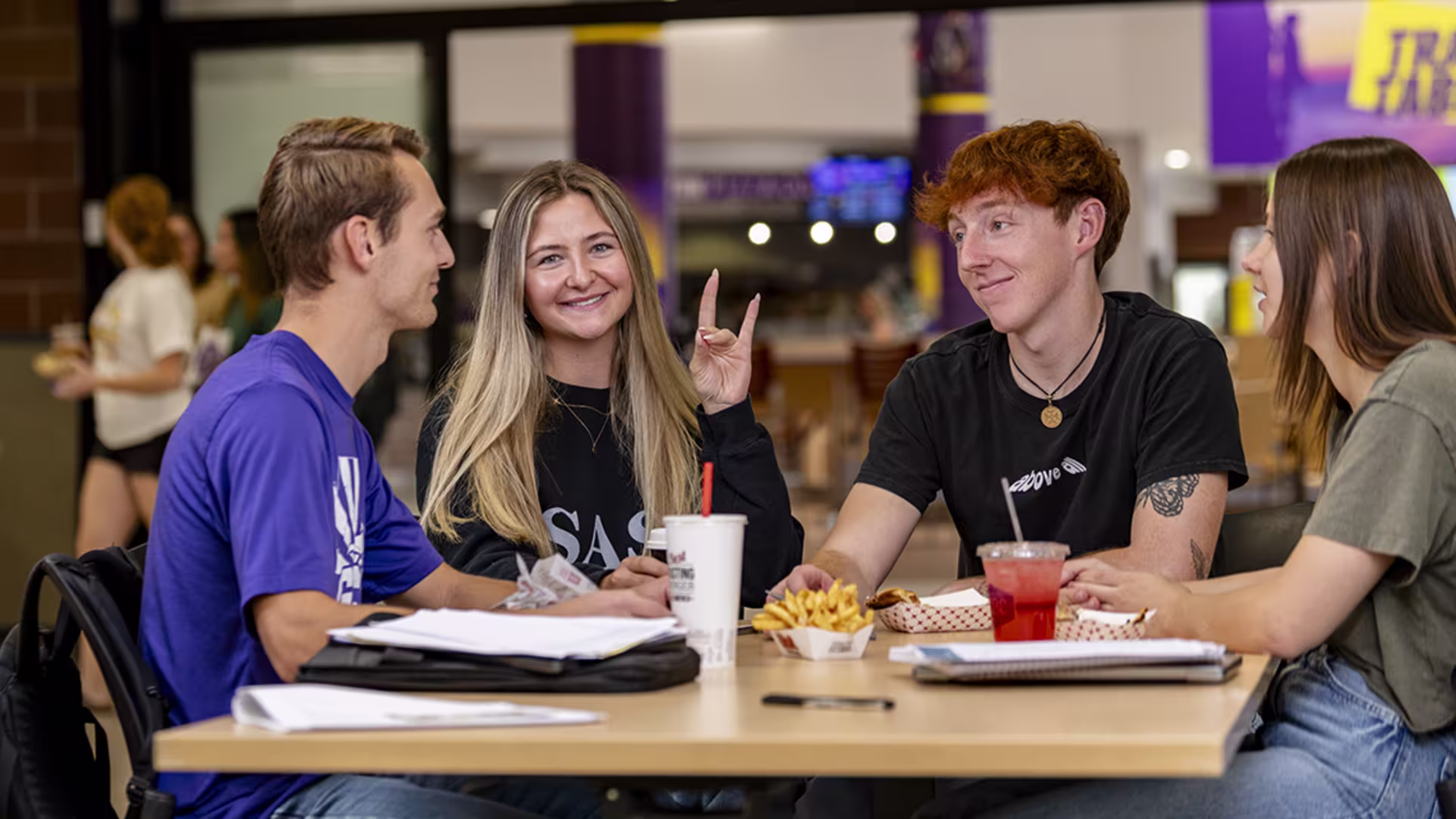 Group of students eating a meal in the Student Union North Dining Hall