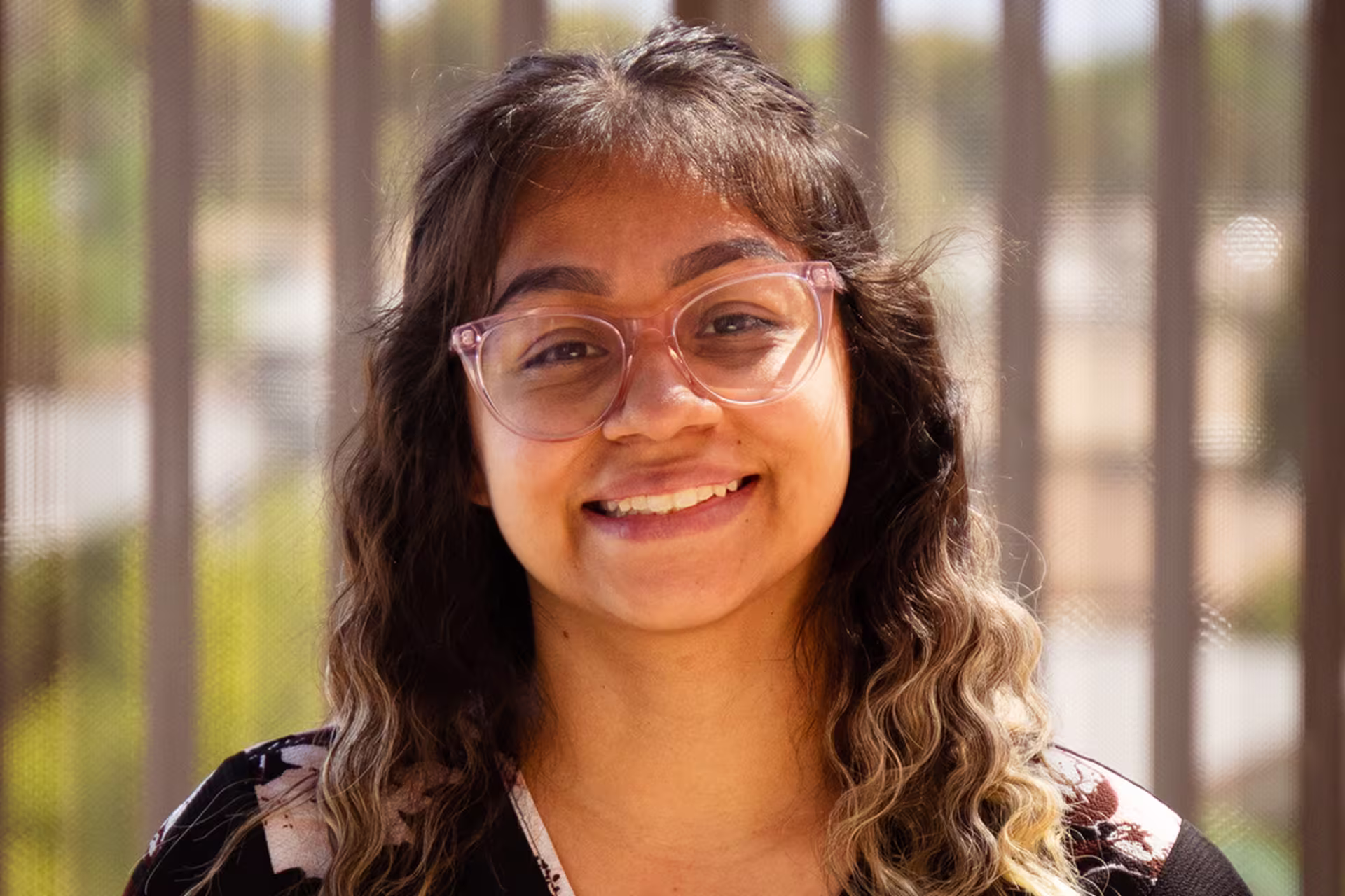 outdoors headshot of honors program development supervisor fanny guerra