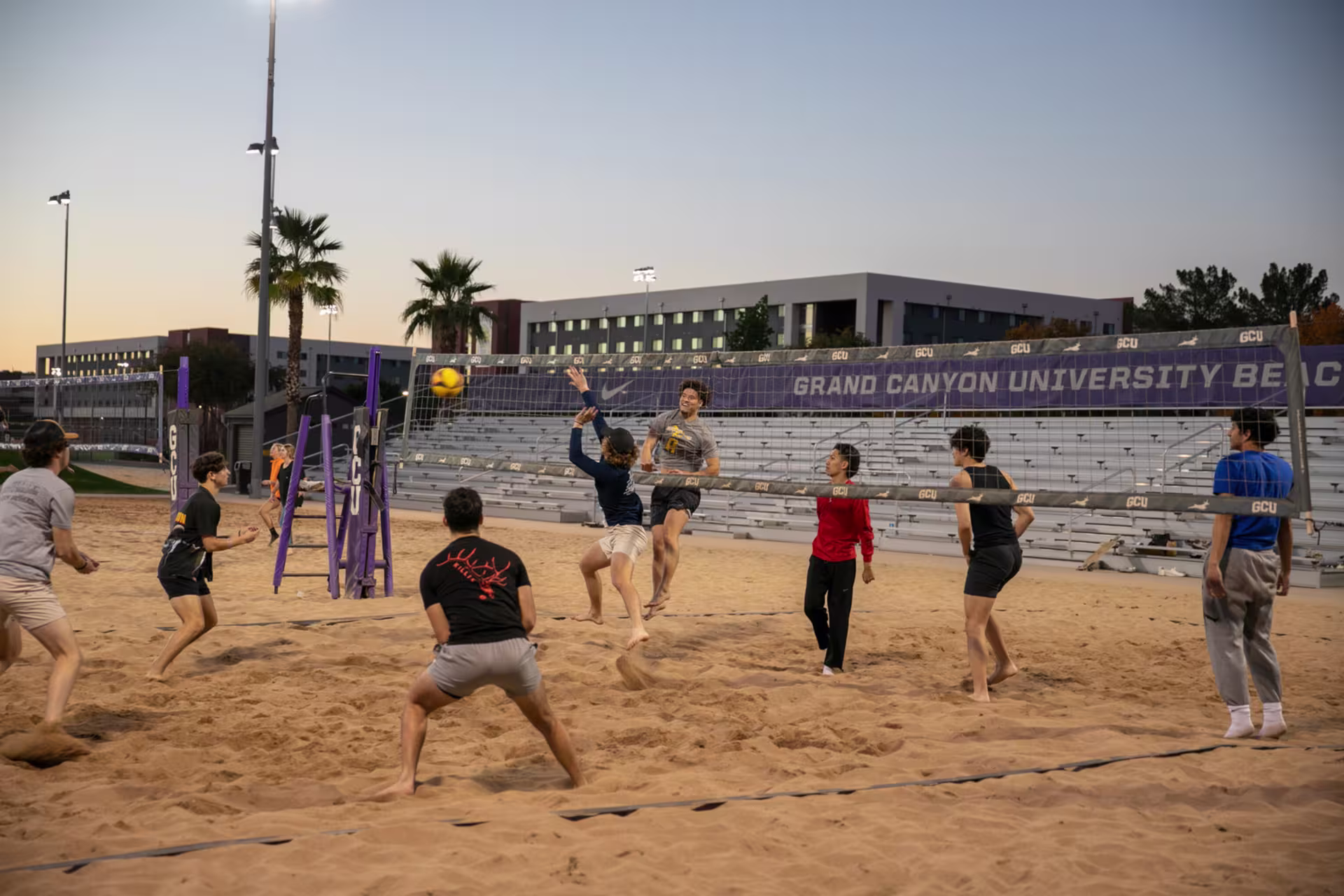 GCU students playing intramural beach volleyball through campus recreation.