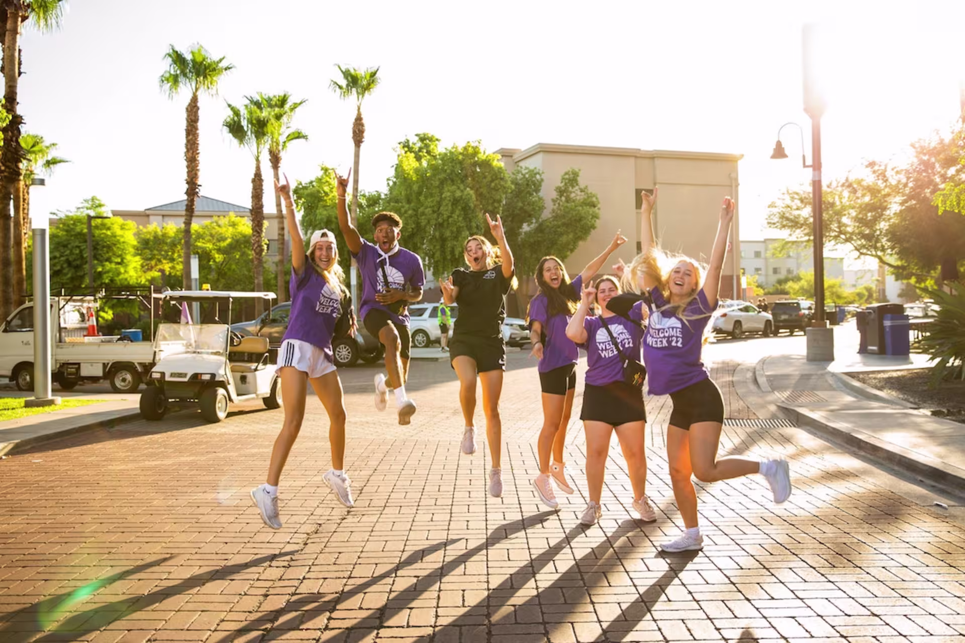 gcu welcome program team smiling outside.