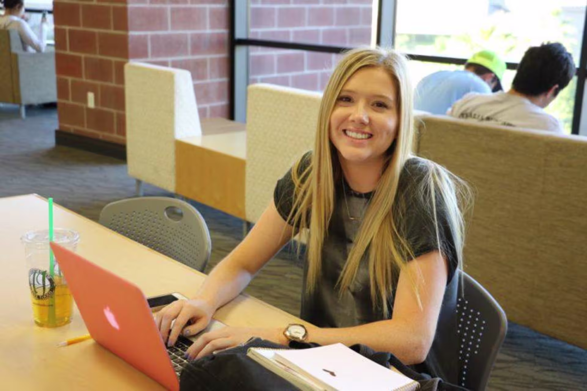 A student studying in the GCU library
