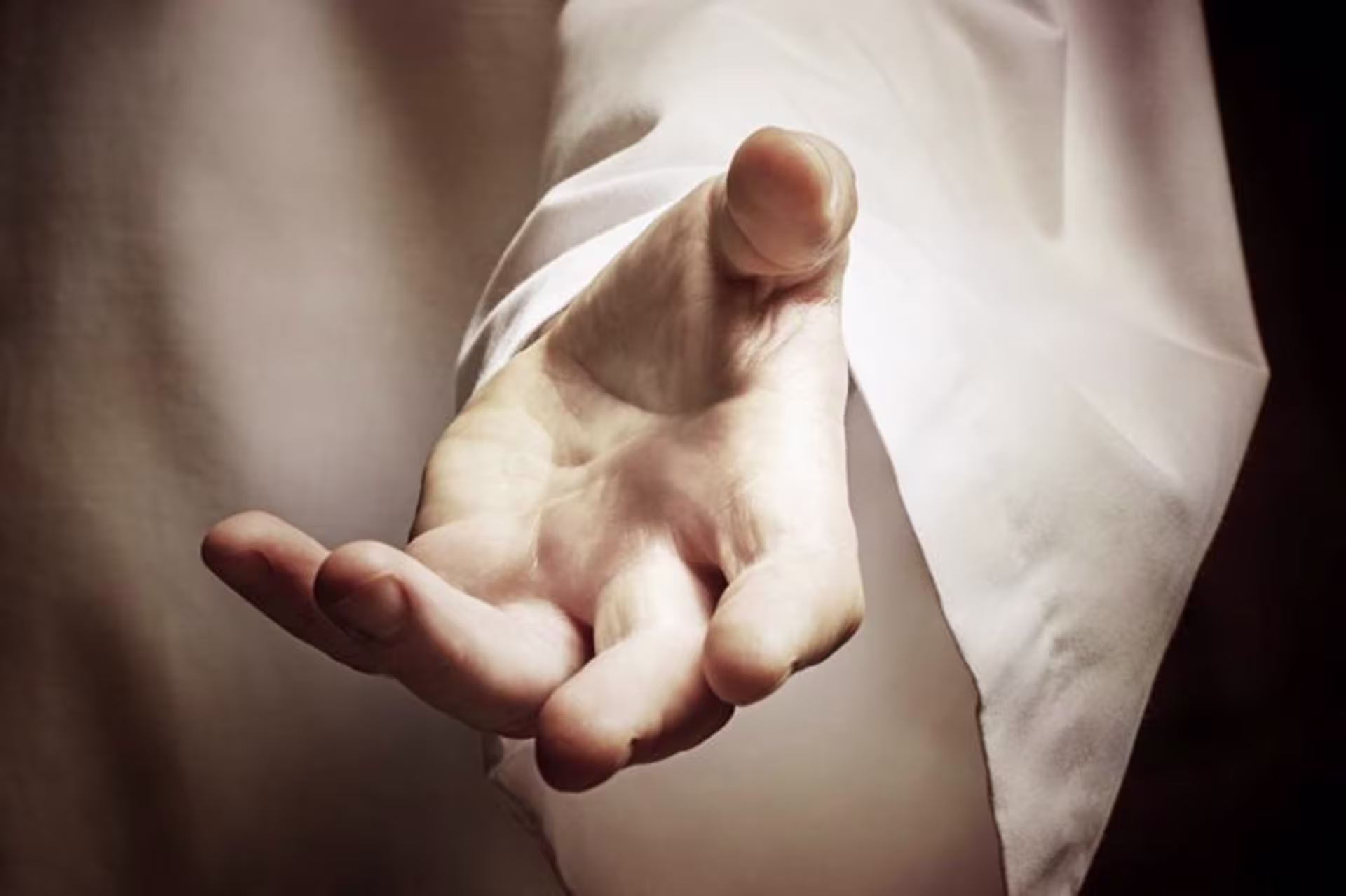 Jesus&#039; hand reaching out