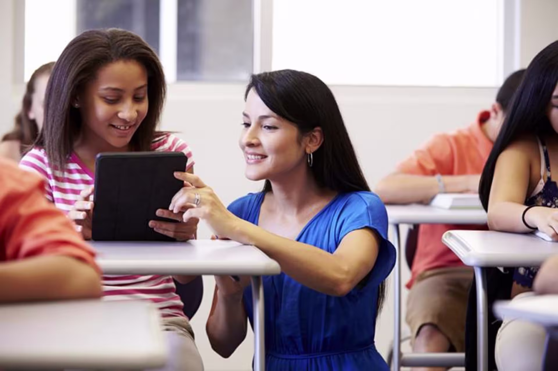 a teacher helping a student