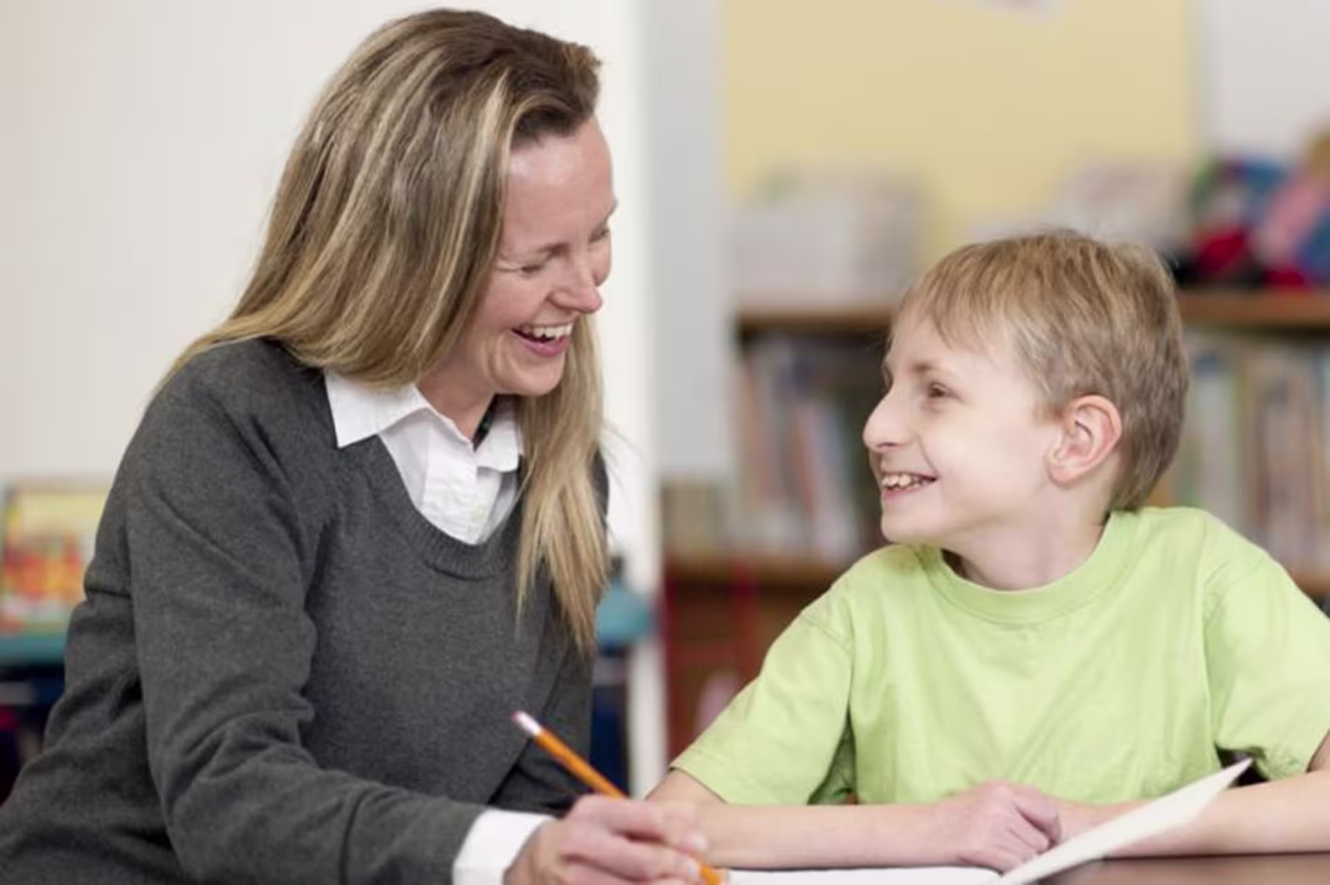 Woman teaching young student