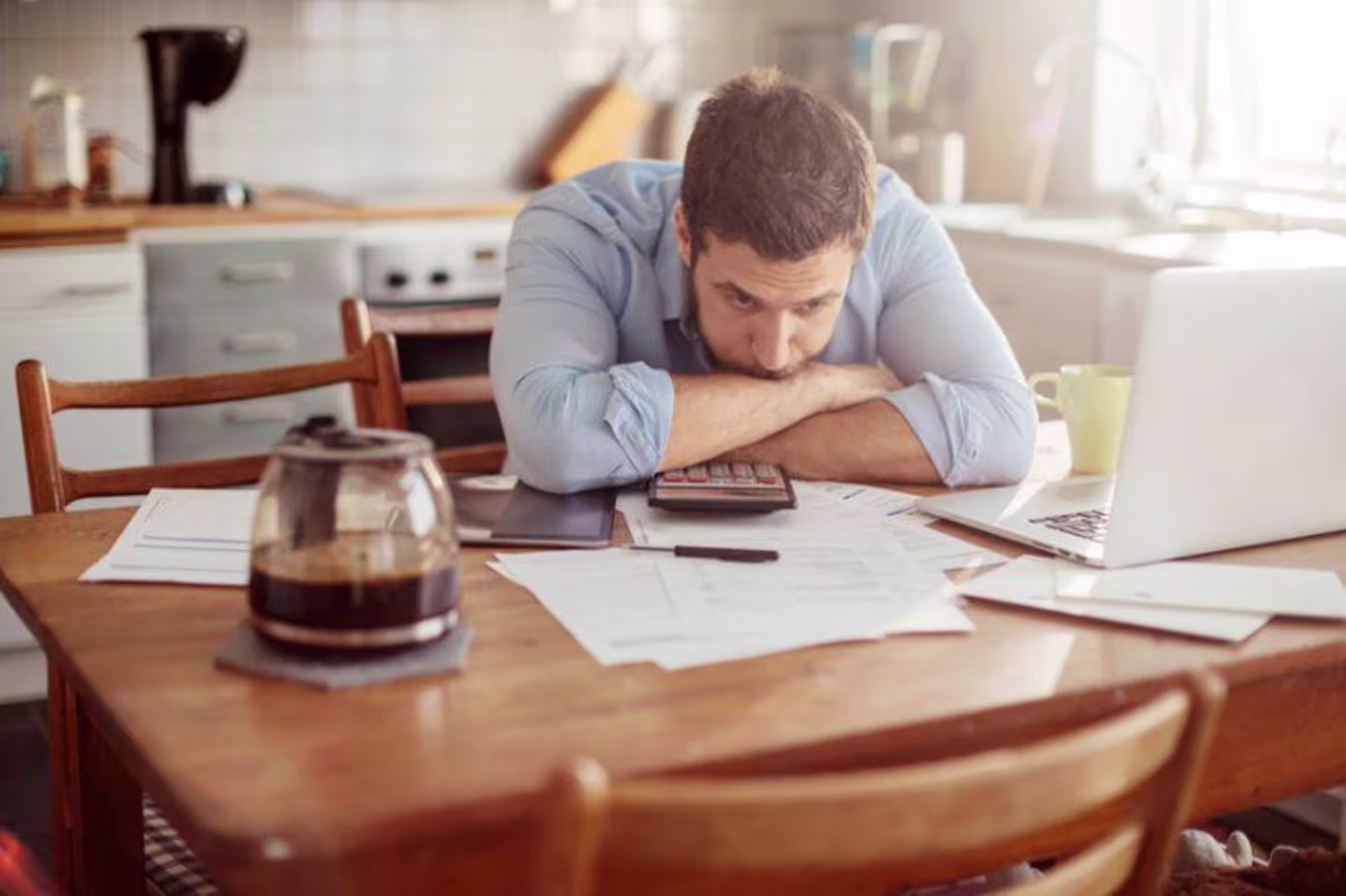 A person reading at a desk