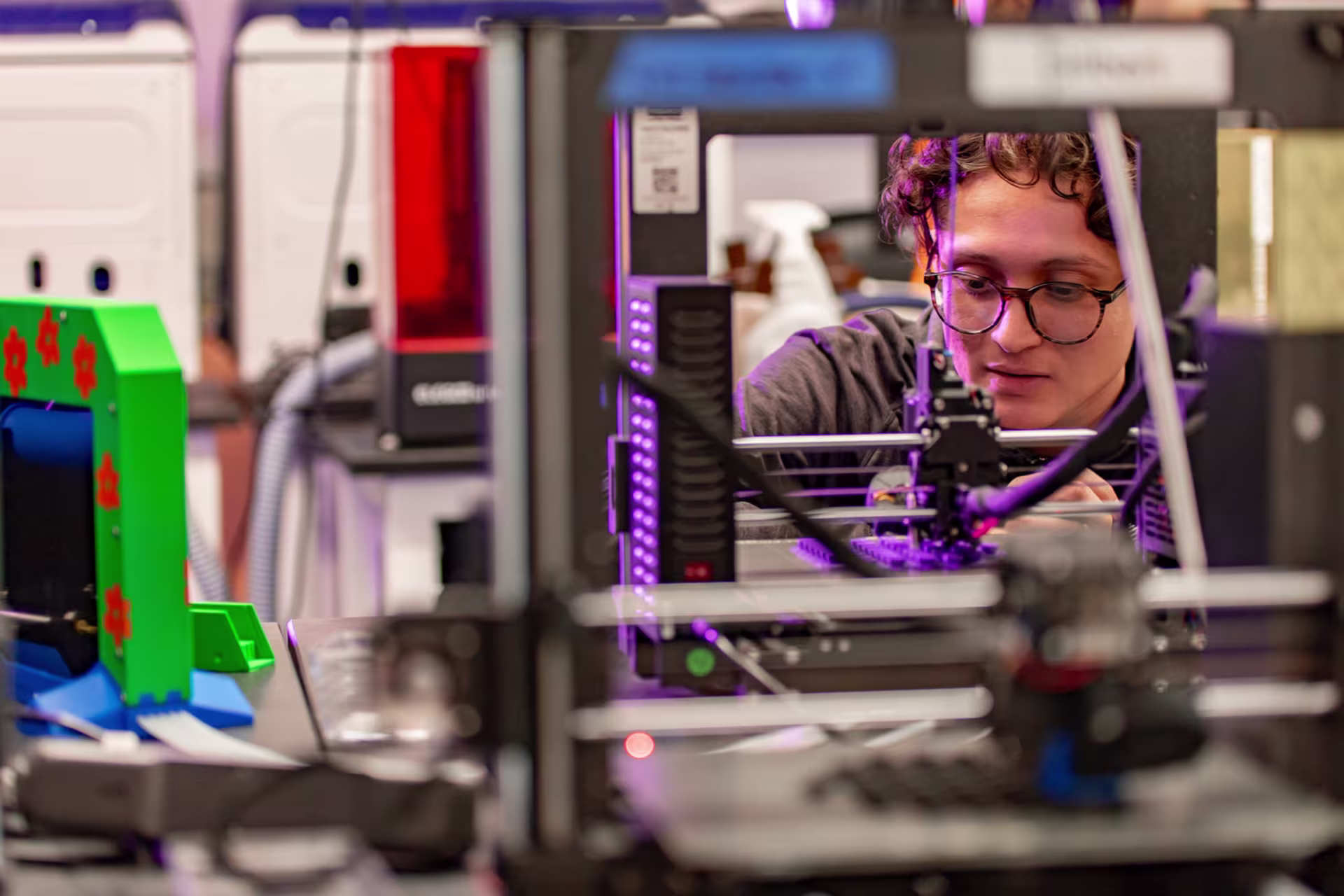 A GCU engineering student working in one of the labs on a project.