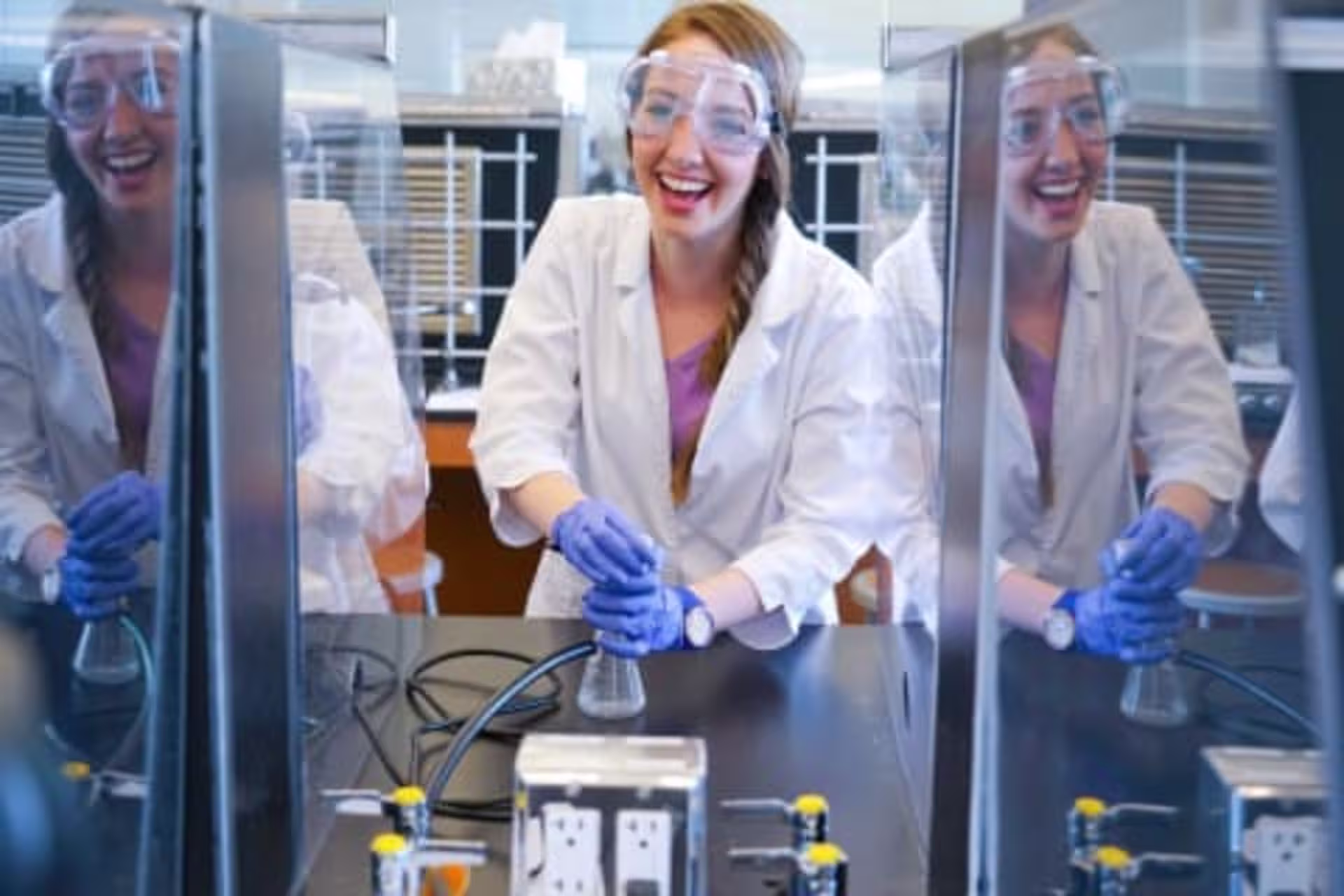 Chemistry student performing experiments in lab setting