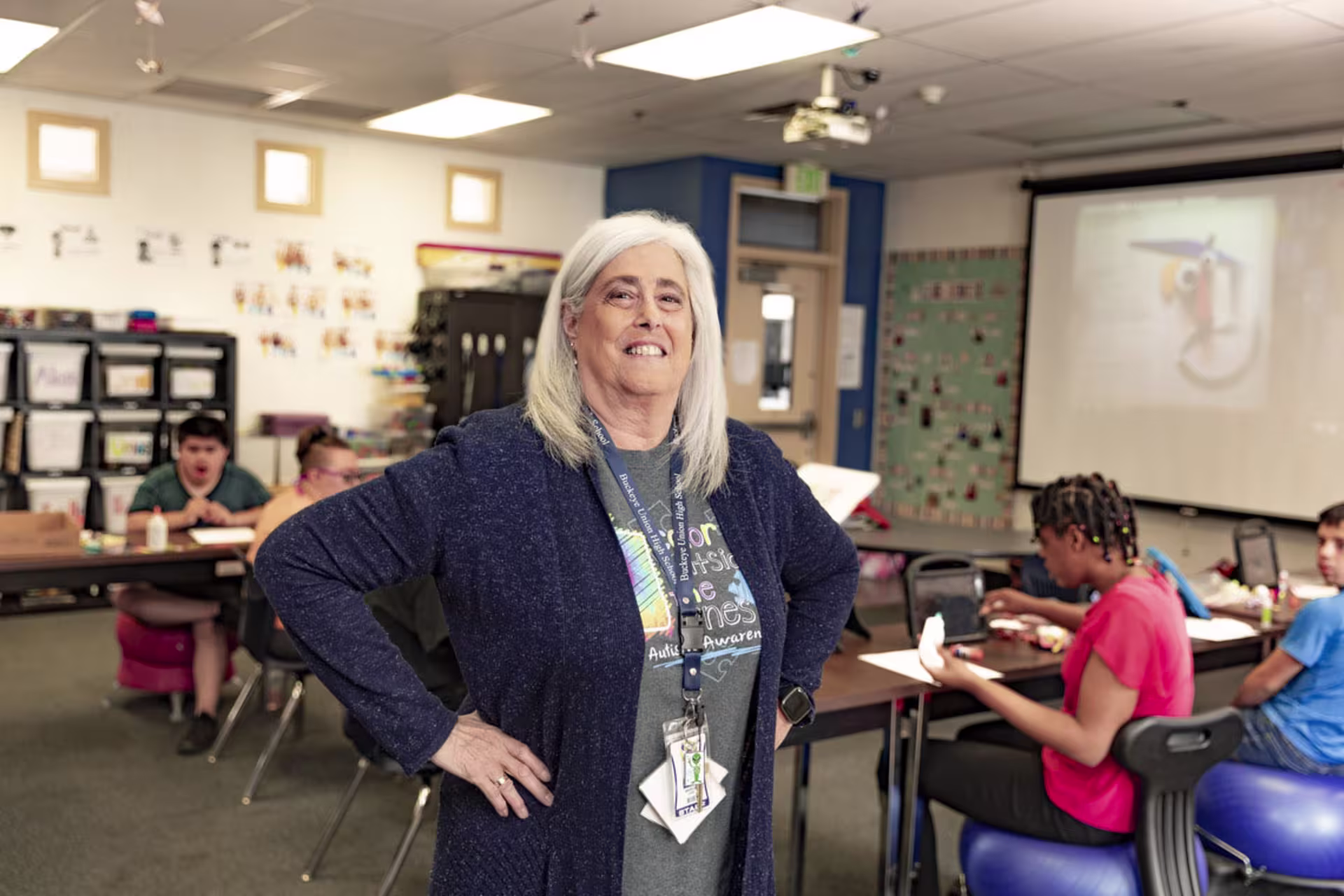 Female special education teacher smiling in classroom