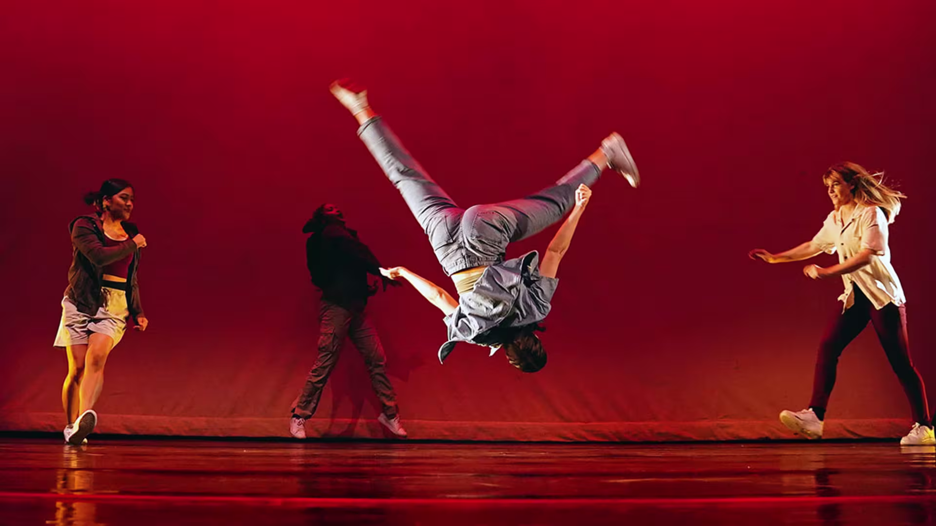 Female performers on stage performing for the When We Rise dance concert