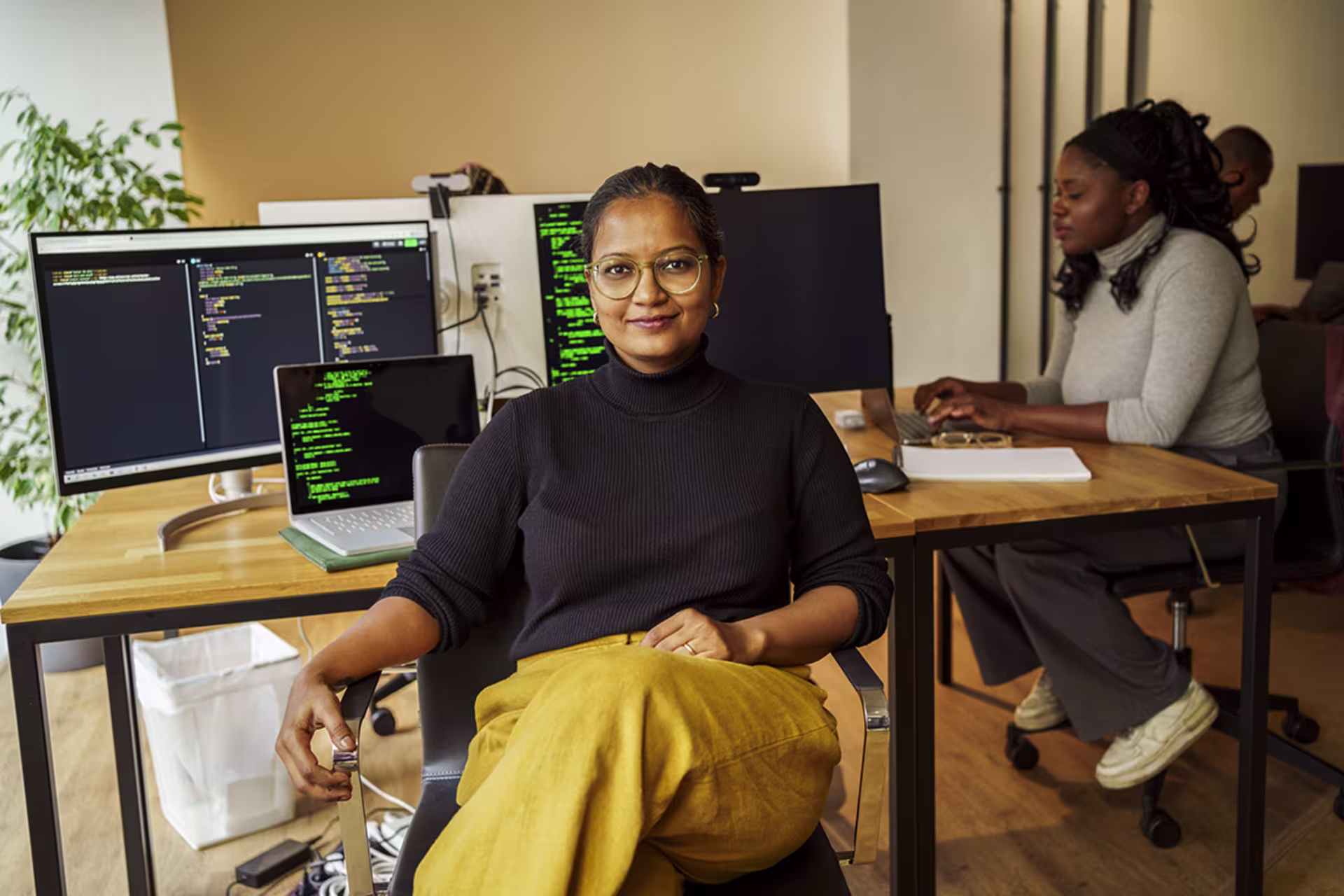 Security Professional Certificate students developing cybersecurity and programming skills in a collaborative technology environment.