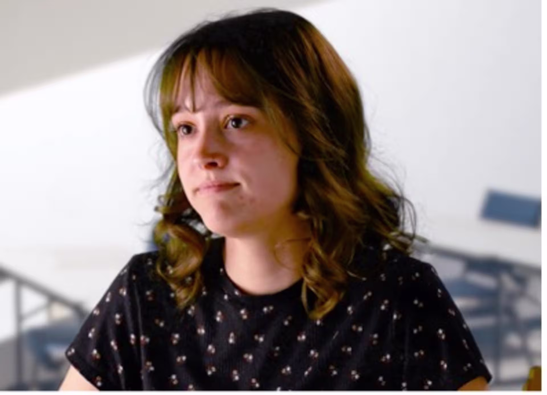Professional headshot of Ruby Kaites, GCU graphic design and advertising student, for a portfolio example.