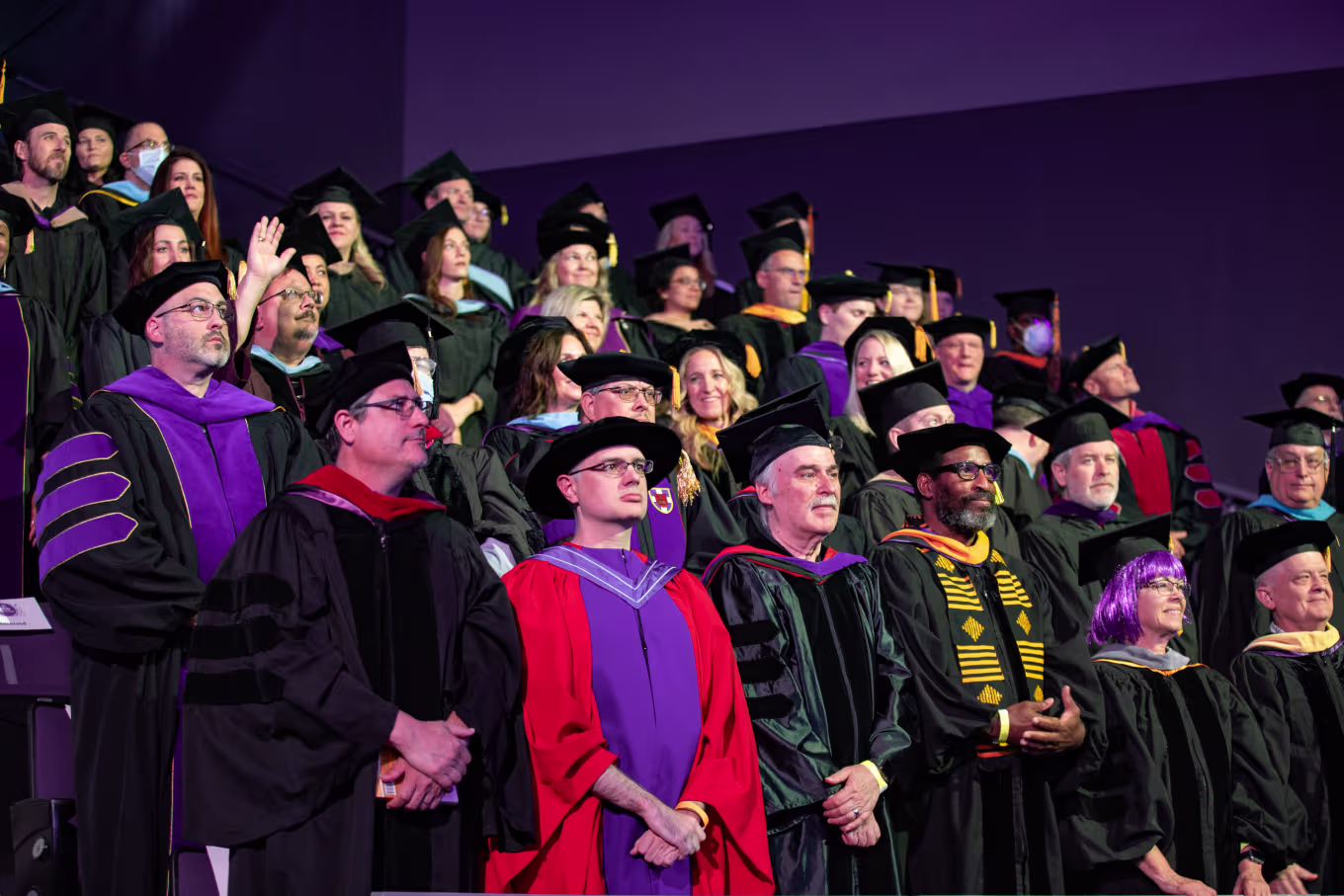 Group of doctoral graduates in caps and gowns for GCU ceremony