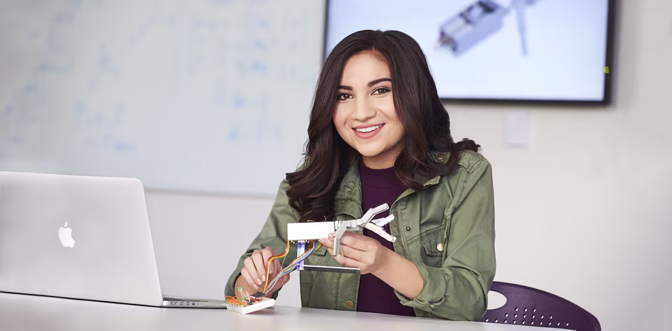 Engineering student holds project