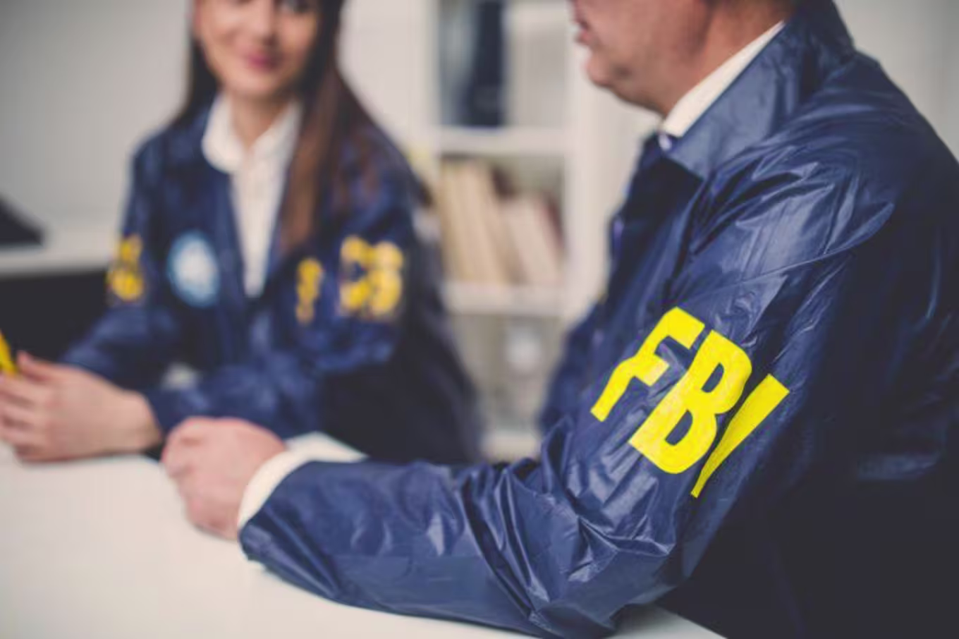 FBI agents sitting together at a table
