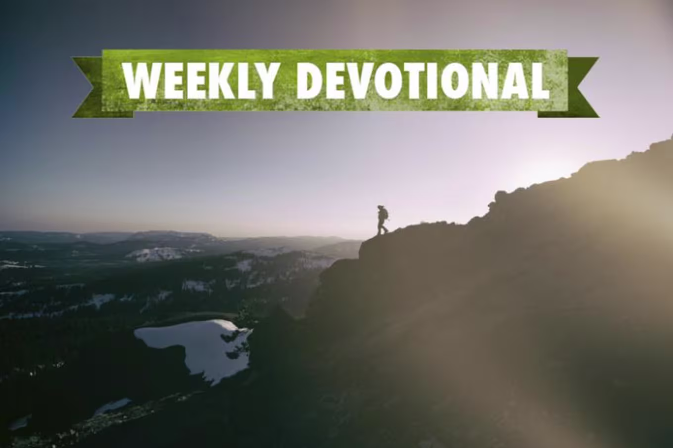 Weekly Devotional: Someone climbing down a mountain