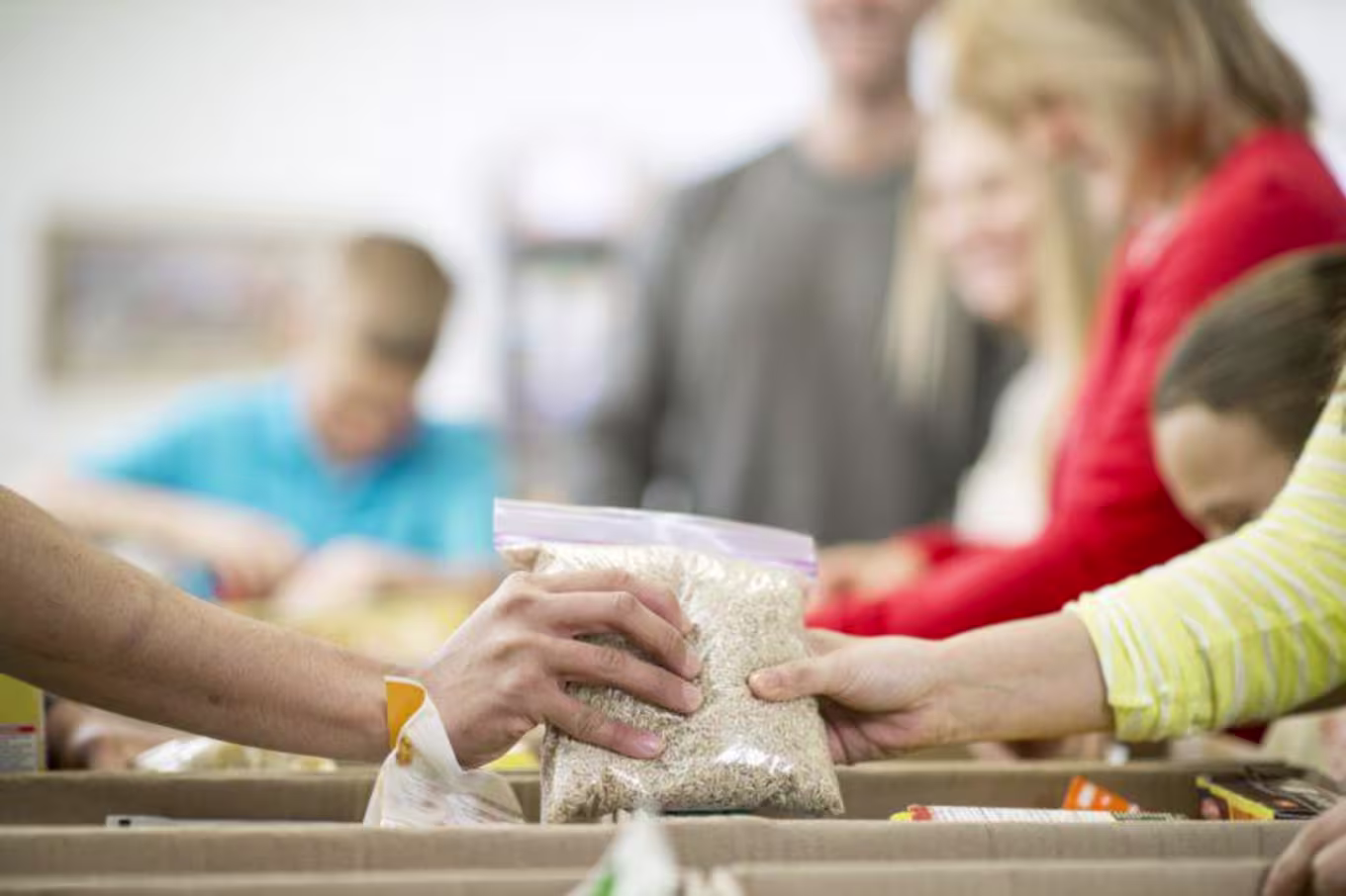 People in line for emergency food boxes