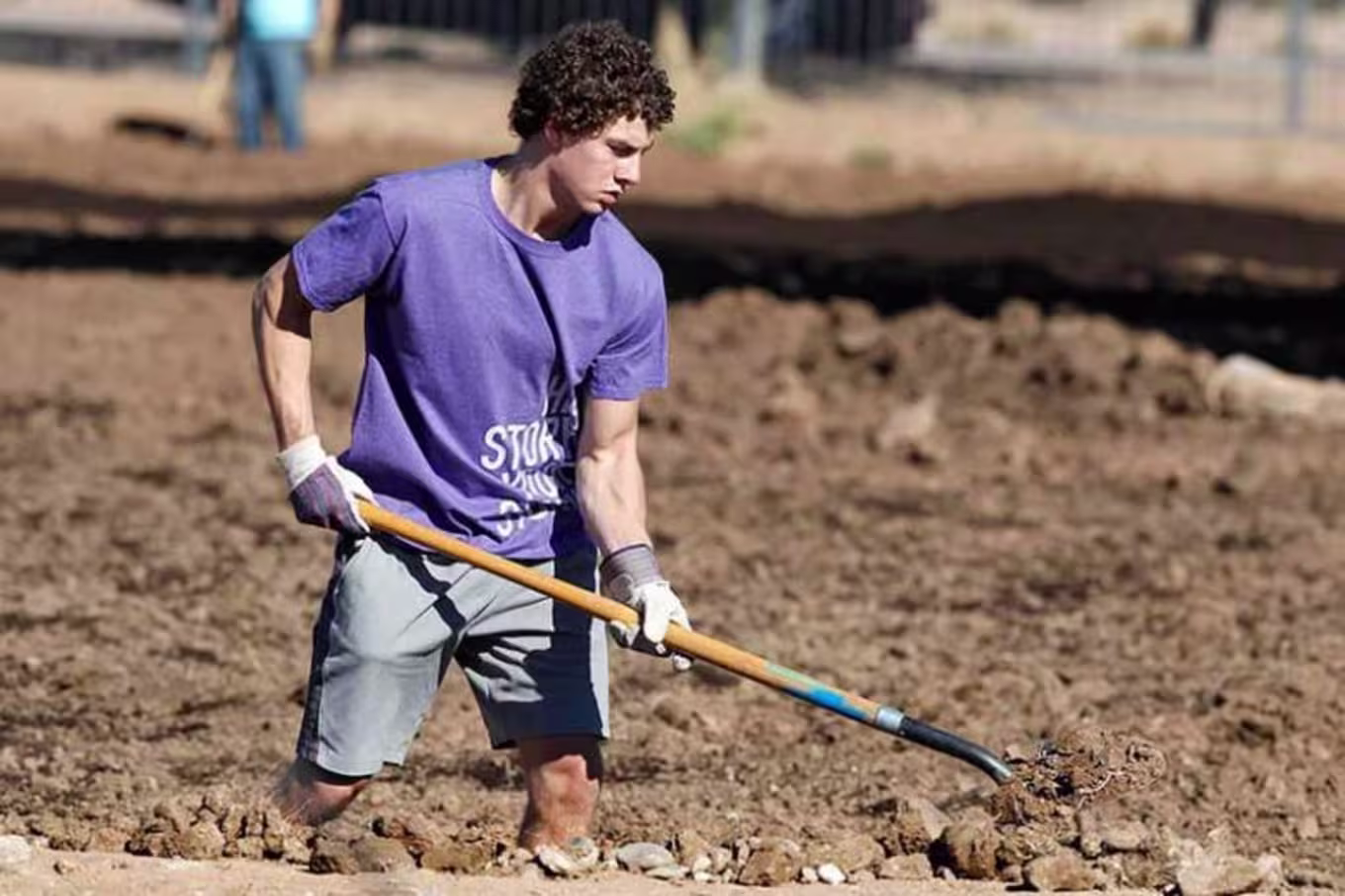 GCU Student doing yard work