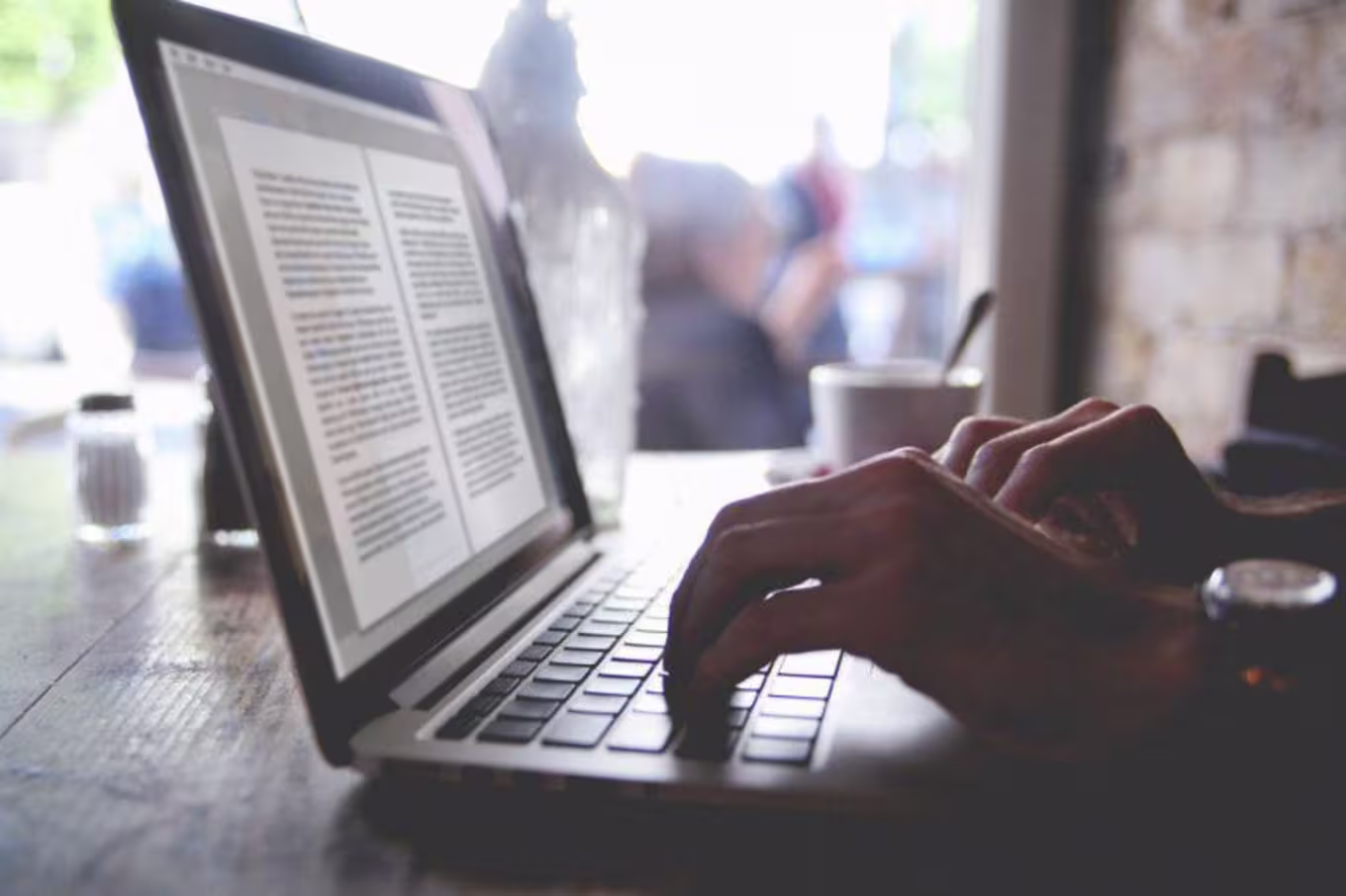 professional writer typing on a keyboard