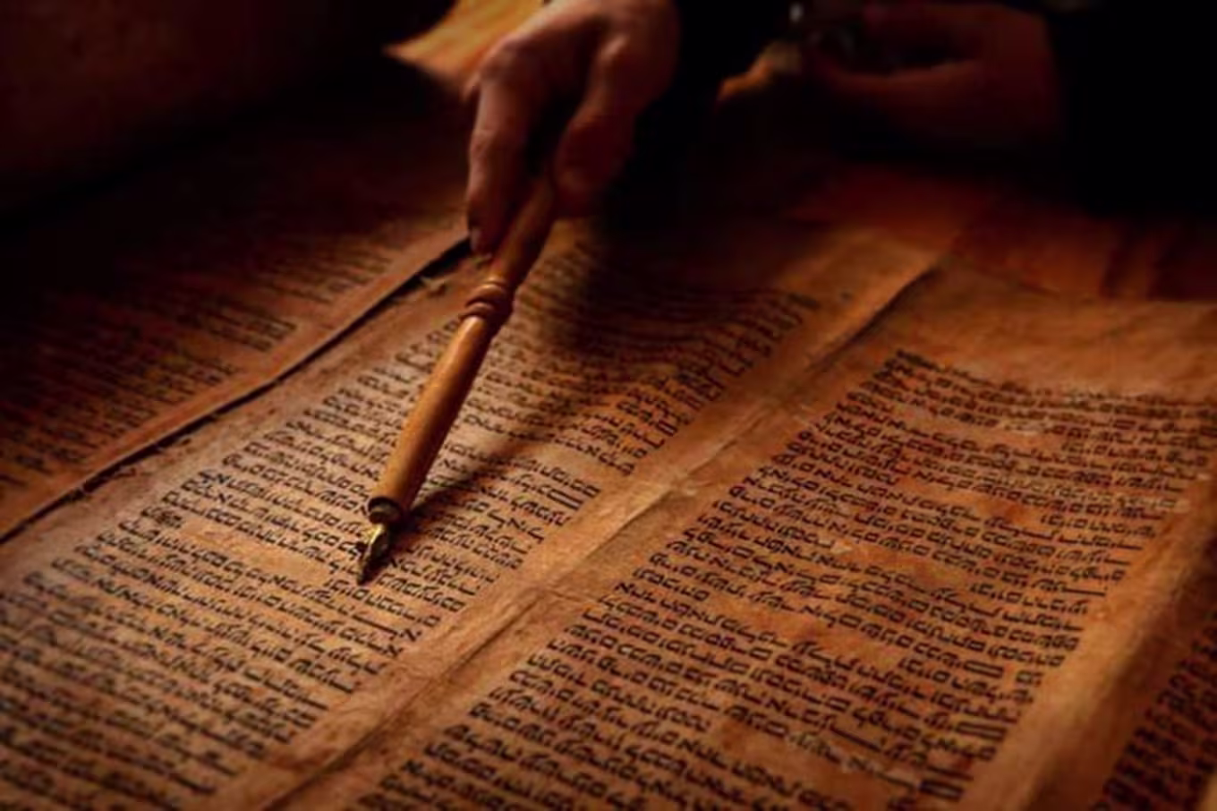 pointing at text in a book
