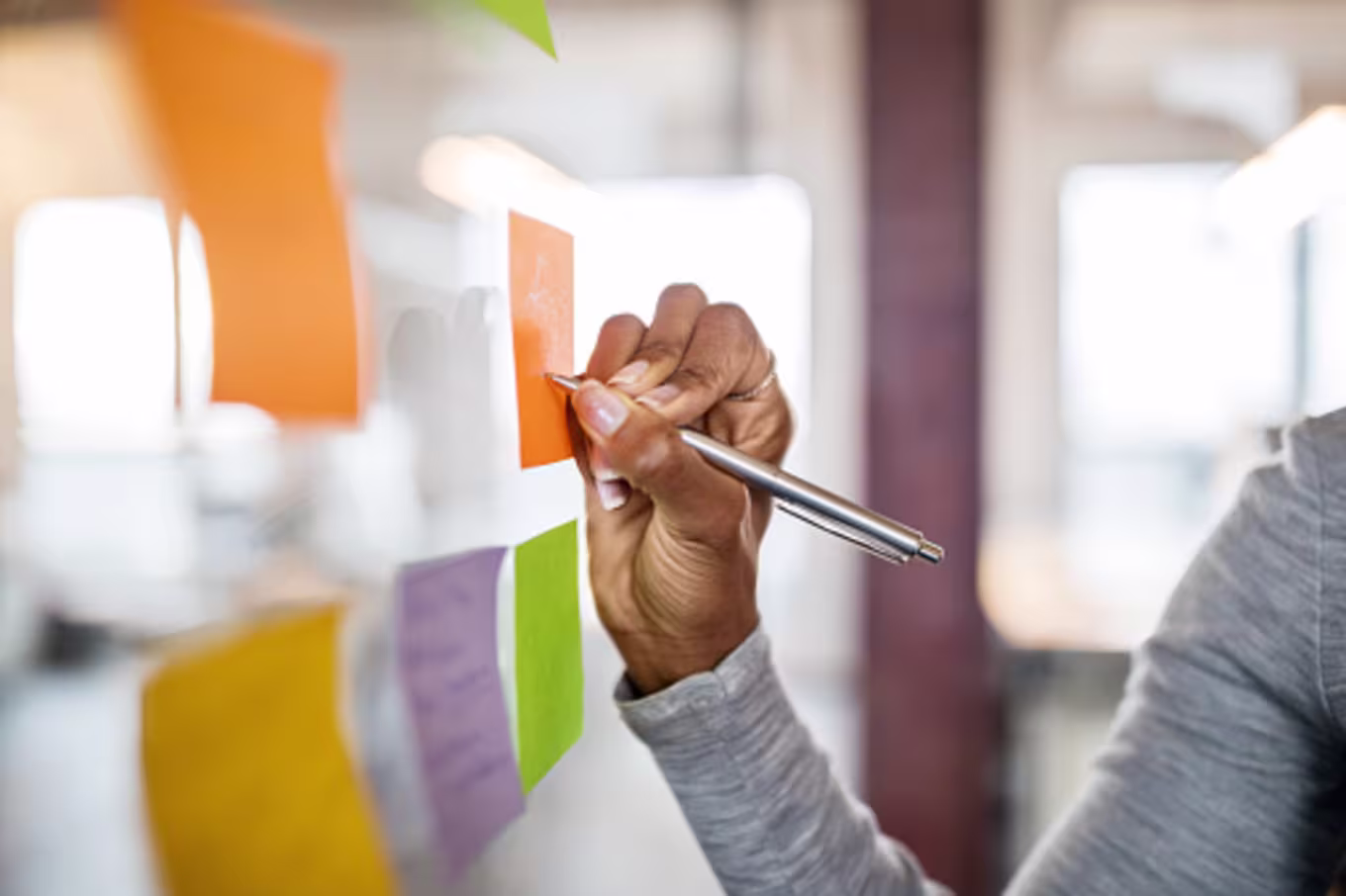 hand writing on a sticky note
