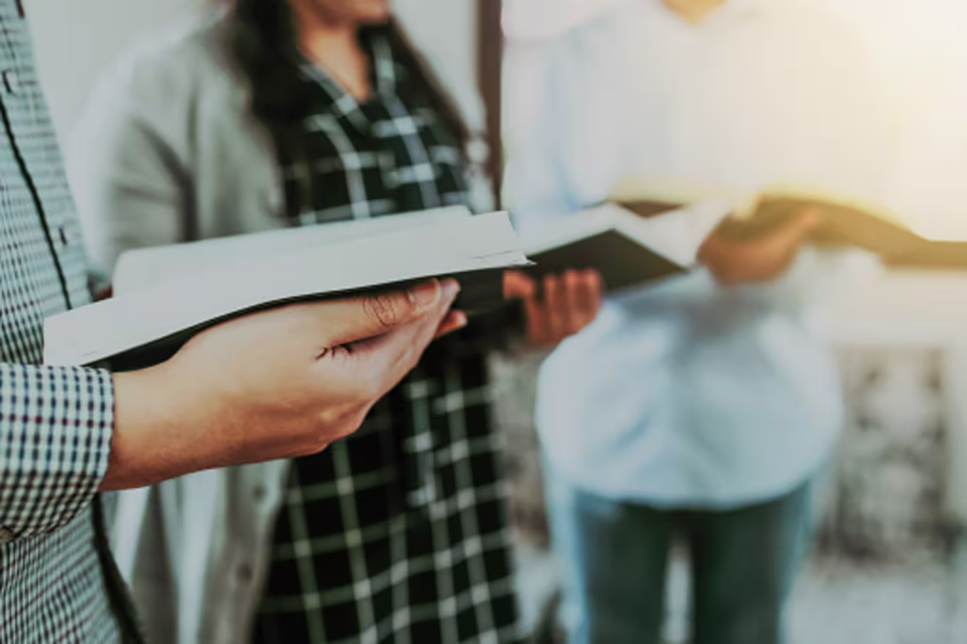 Christian group reading the Bible to learn Christian culture