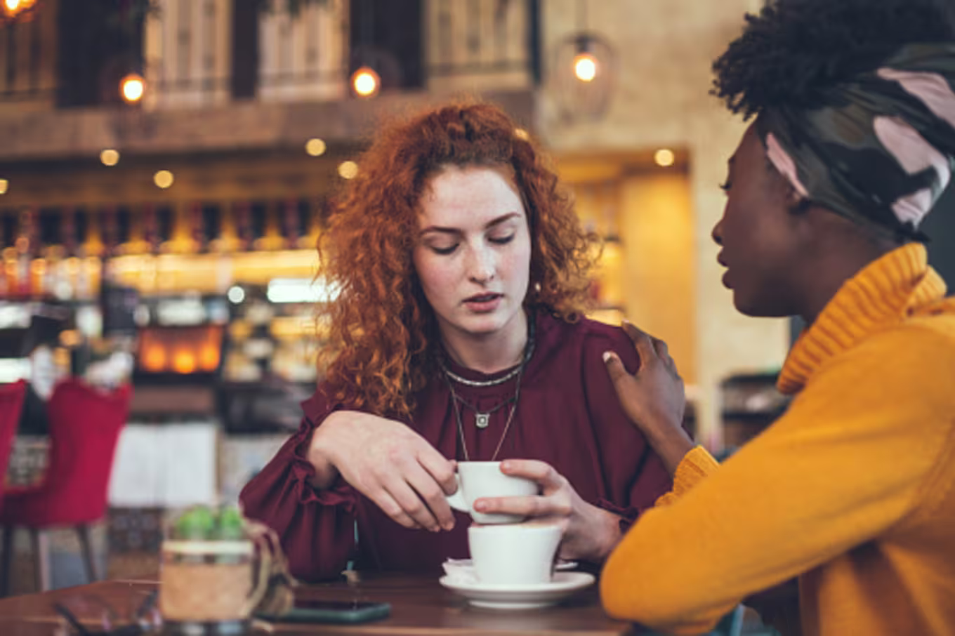 Two girl friends meet for coffee and show confession is good for the soul