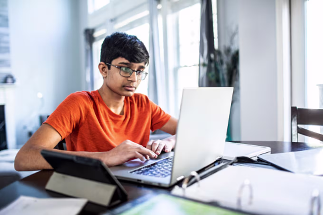 ESL student completing homework online
