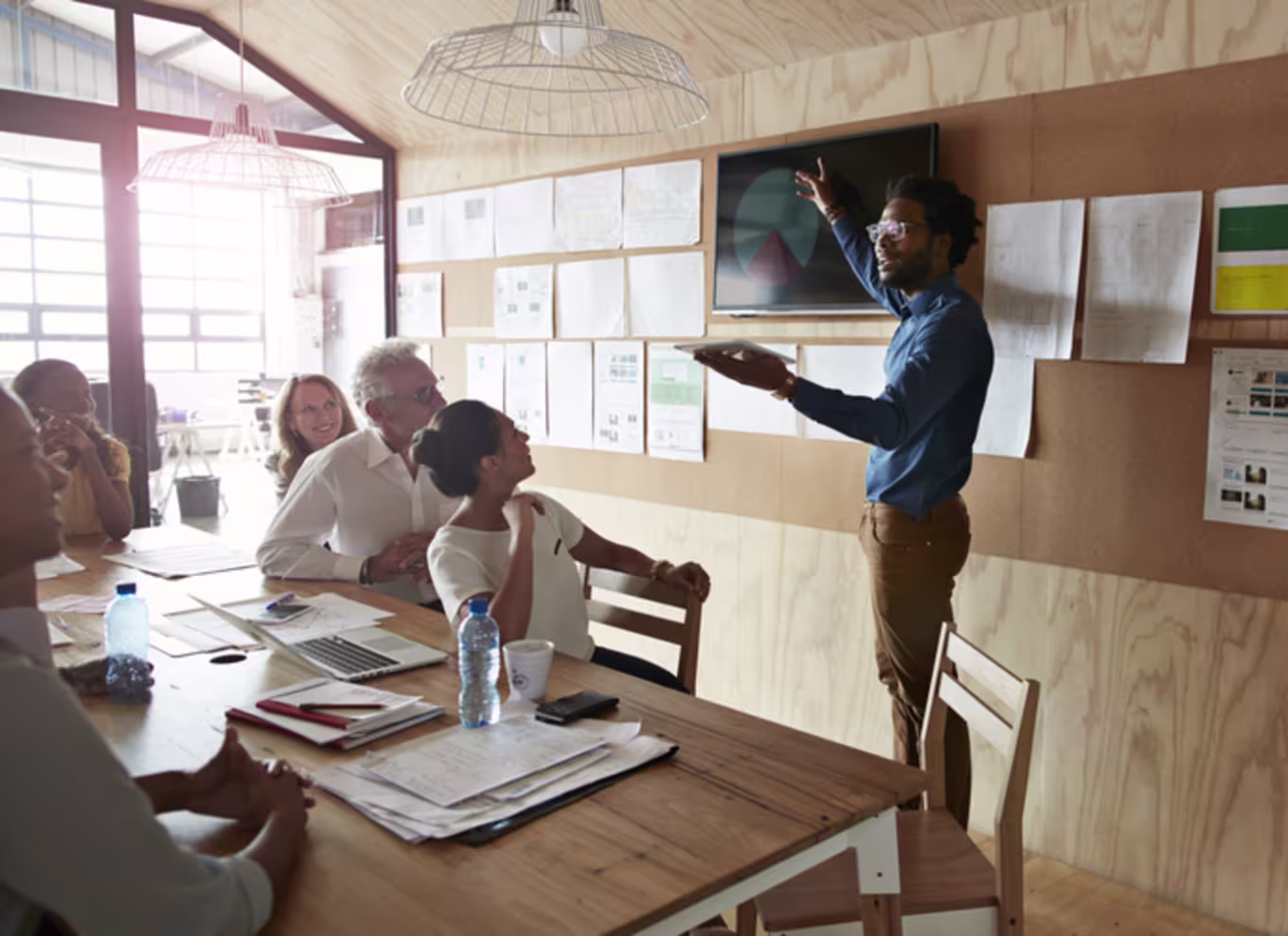 A group of people in a business meeting