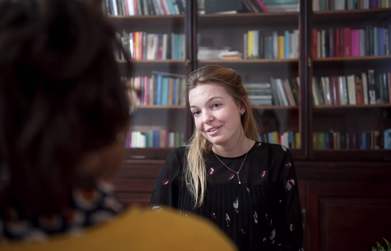 Woman receives counseling from a clinical psychologist