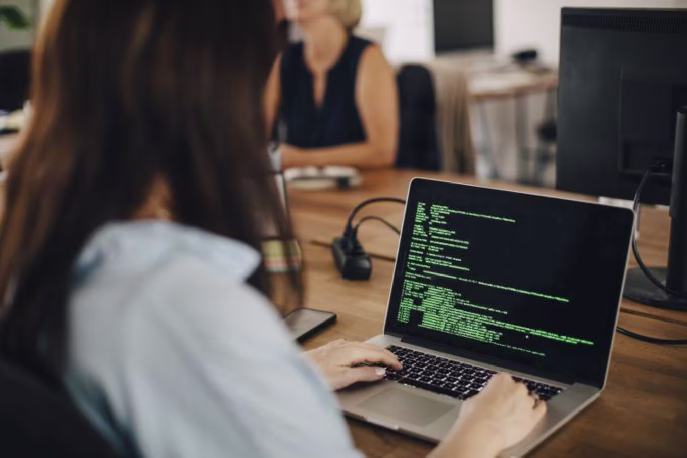 Woman working on code 