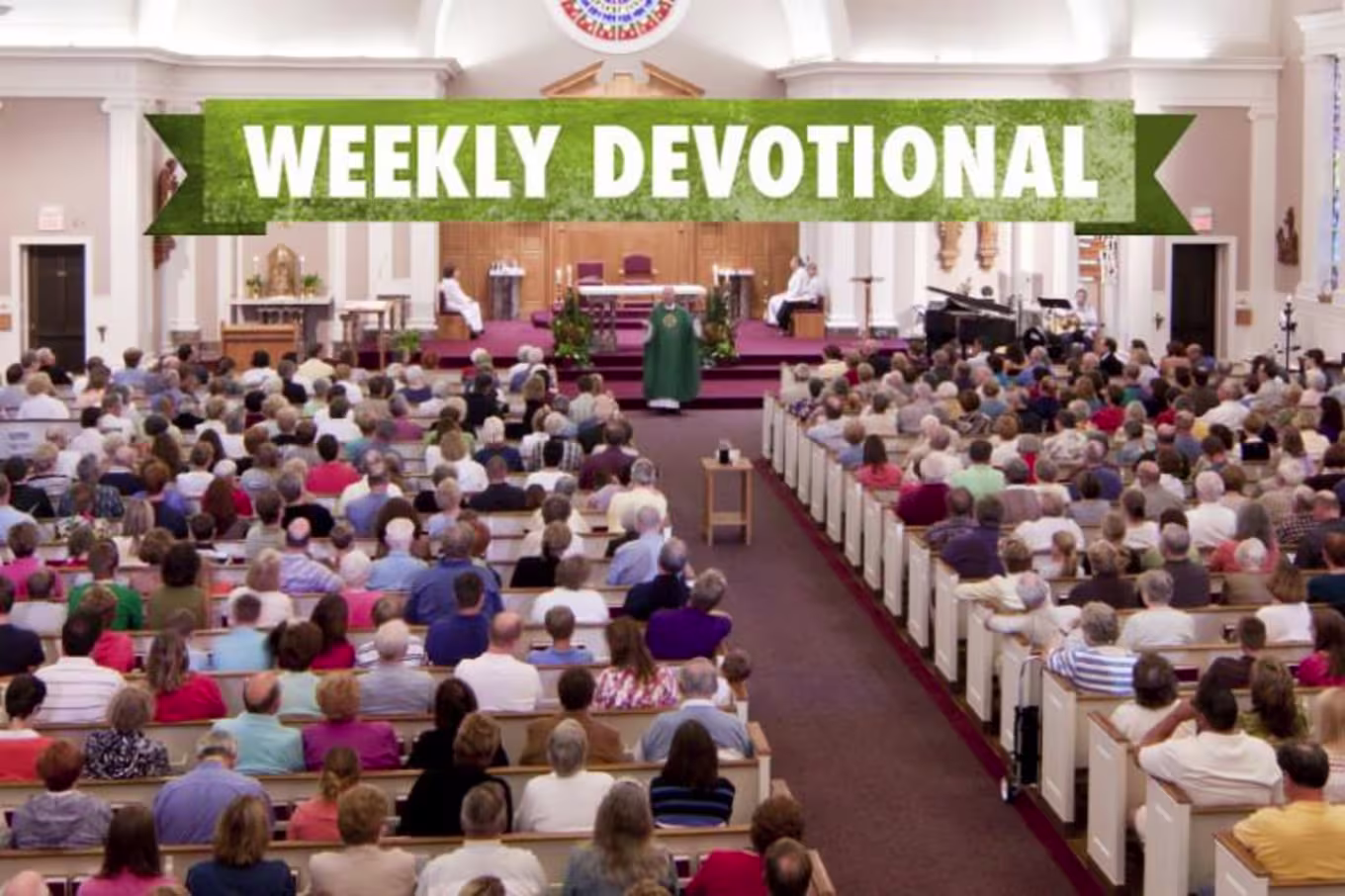 A congregation listening to a sermon under the Weekly Devotional banner