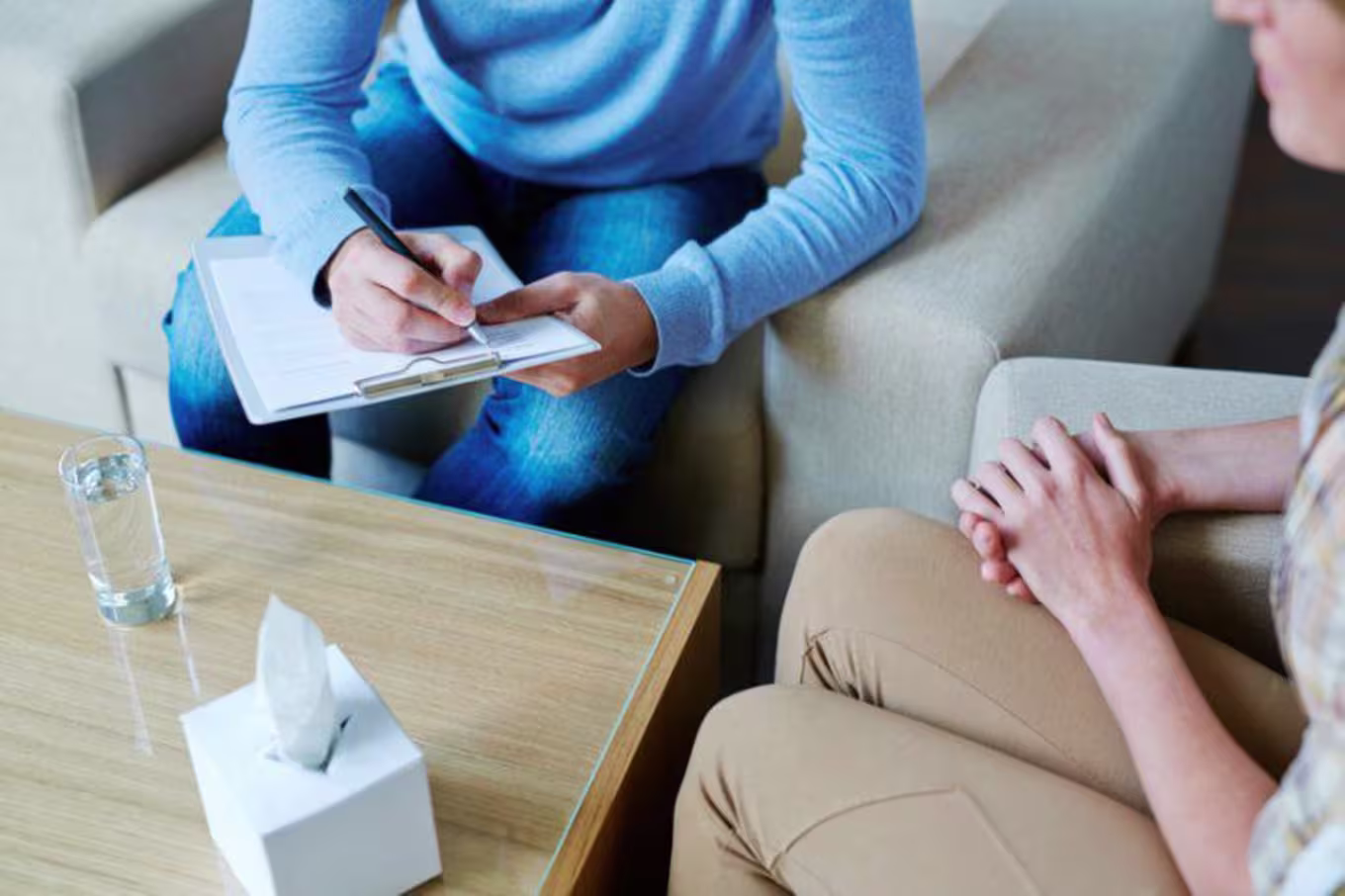 Overhead view of a session with a behavioral health specialist and client