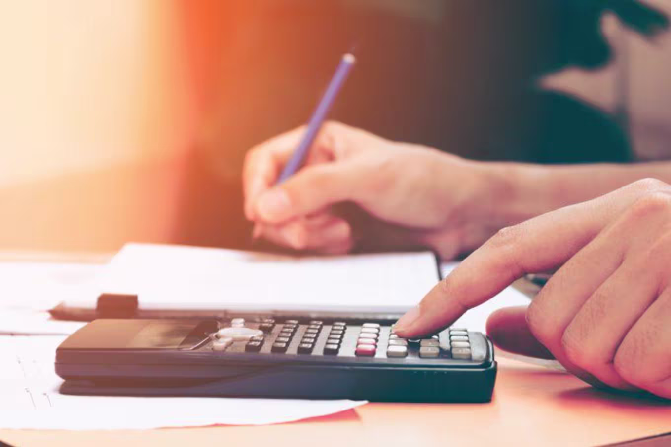 A student doing tuition calculations