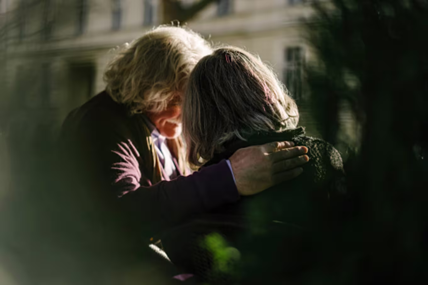 women praying for each other