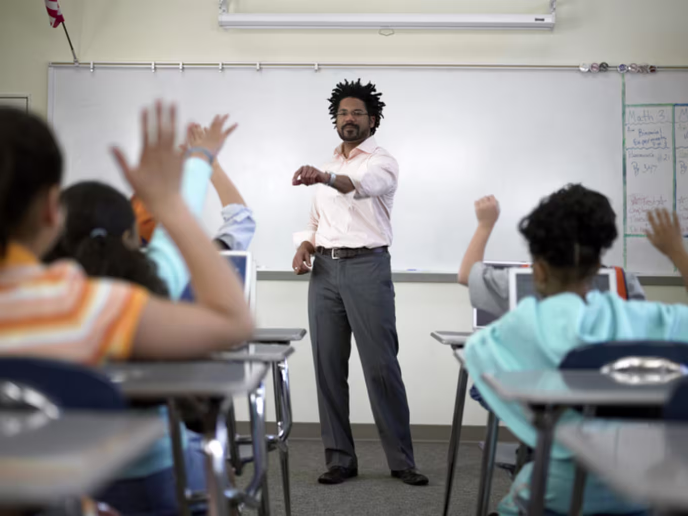 teacher at the front of the classroom
