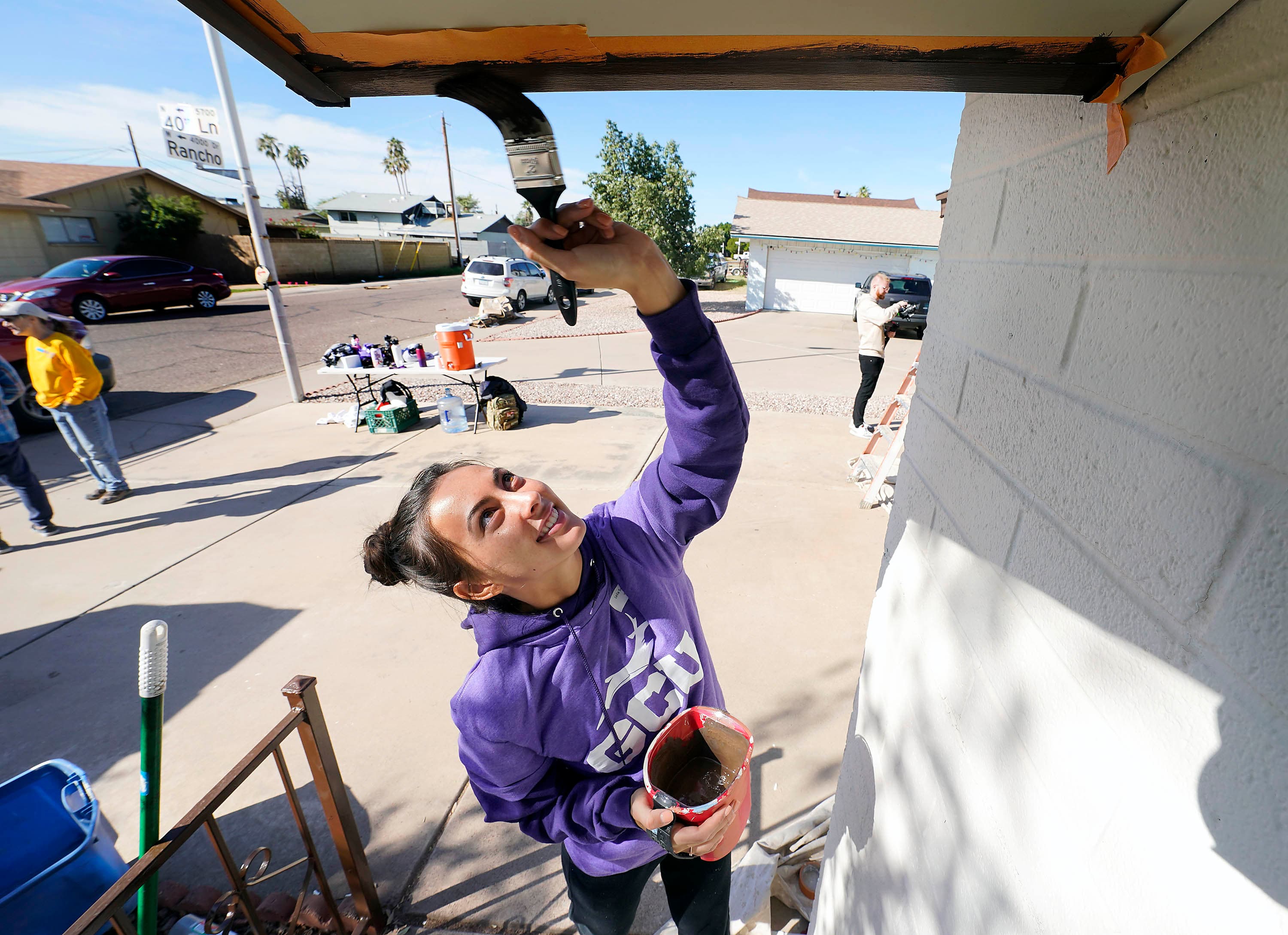 GCU lopes go local student fixing roof