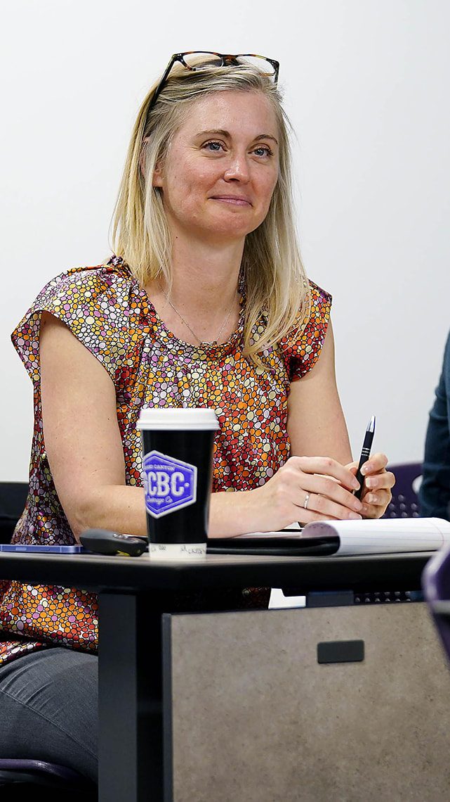 Nancy barto a female blonde adult learner attends a social work lecture