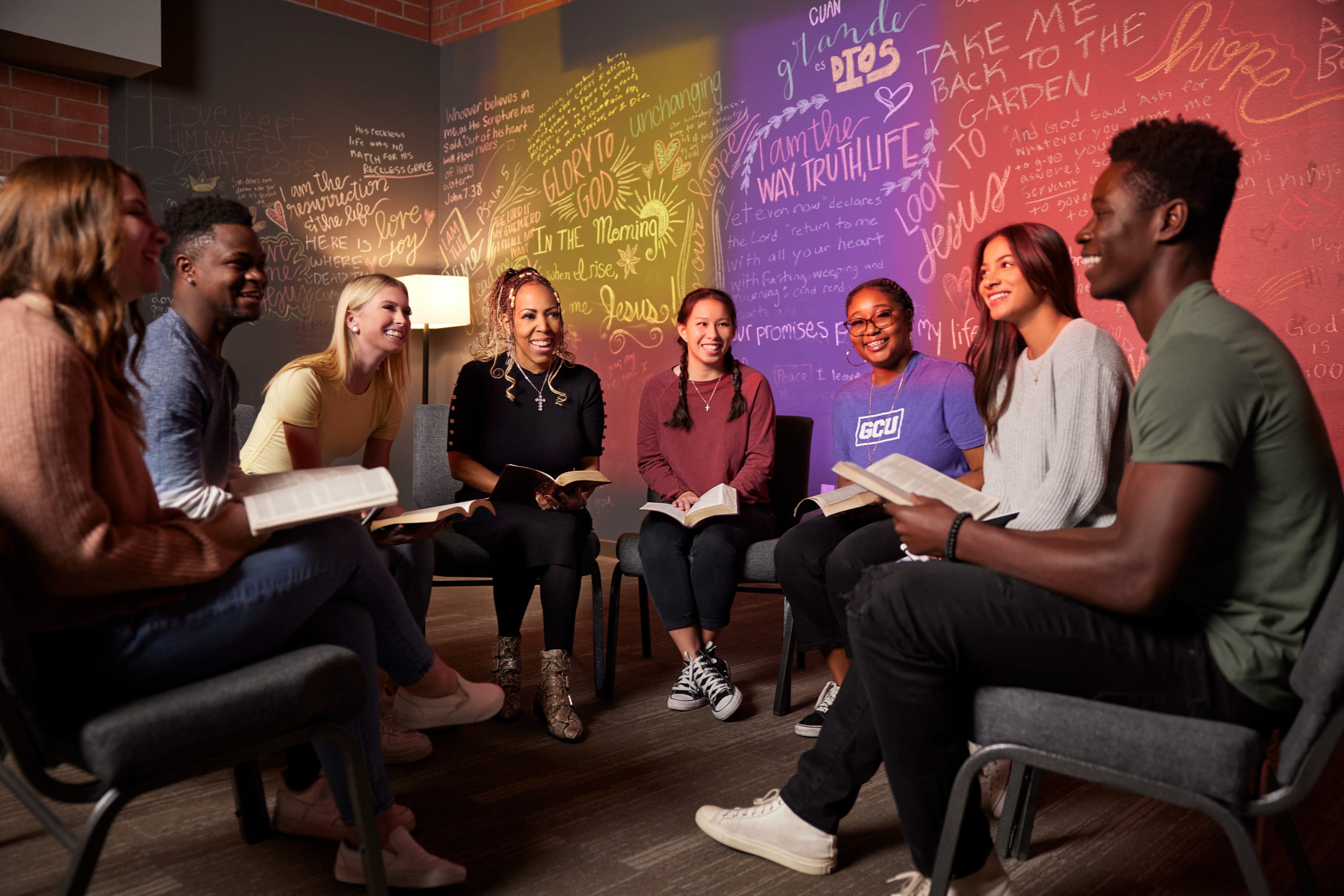 students sitting in a circle for bible study