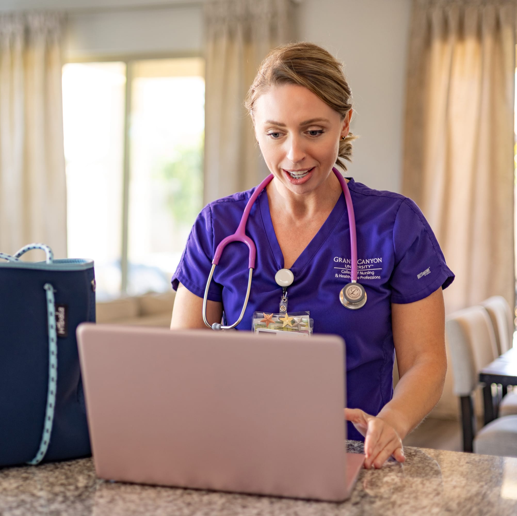 Online nursing student using laptop 