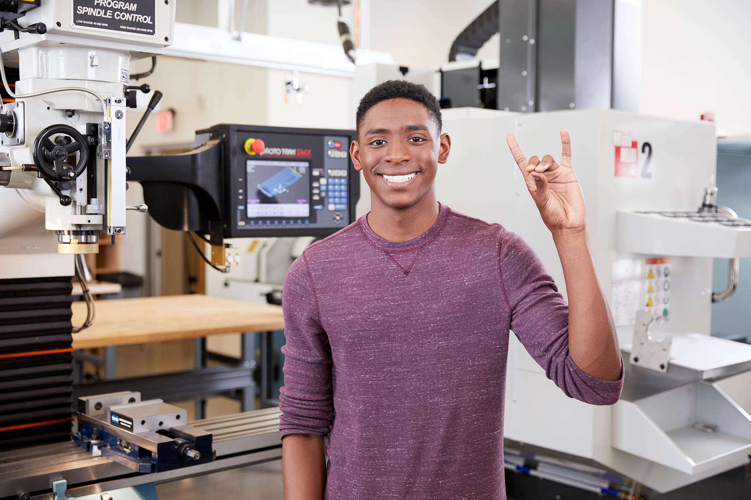 engineering student throwing up the lopes